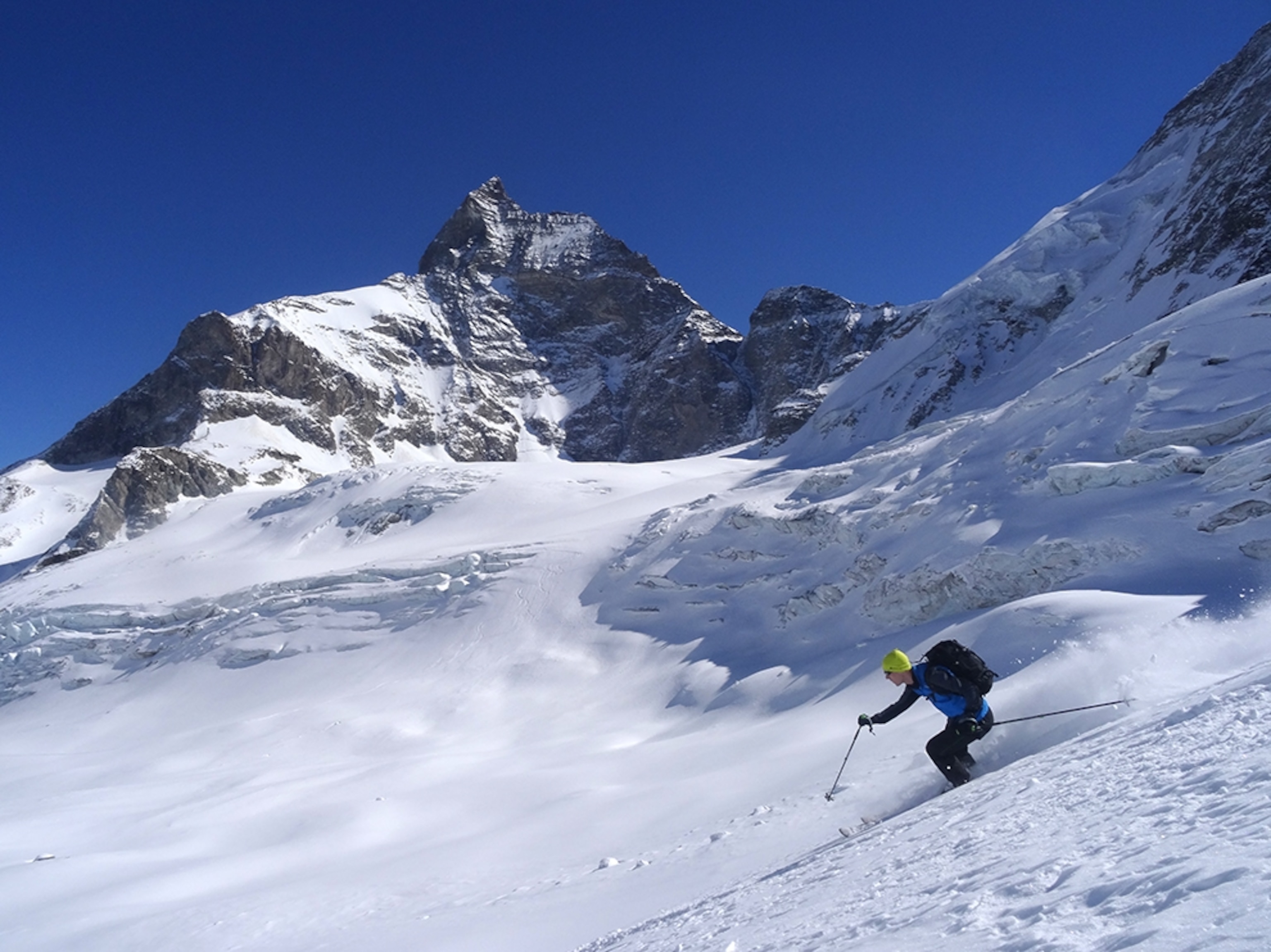 a man skiing down a mountain