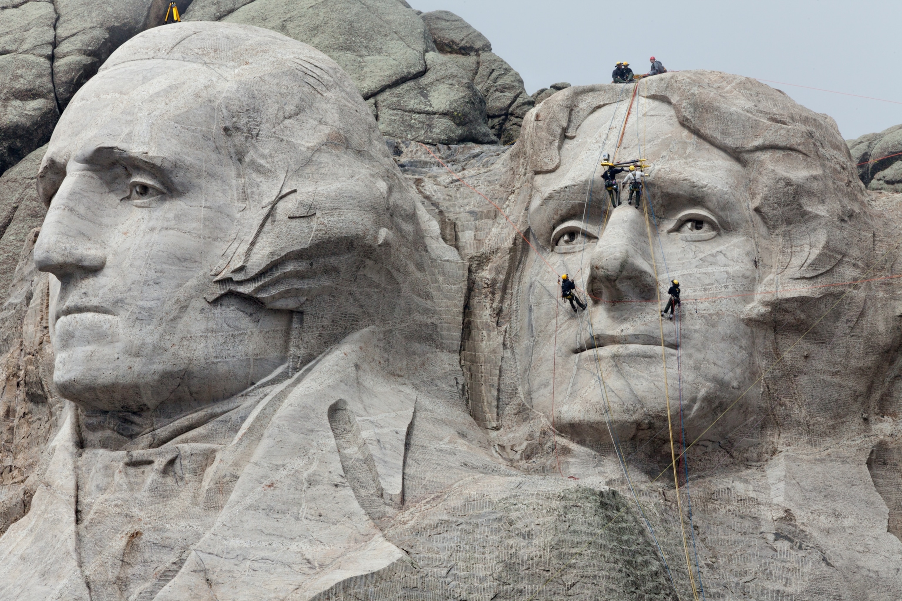 workers positioning 3-D scanners on Mount Rushmore