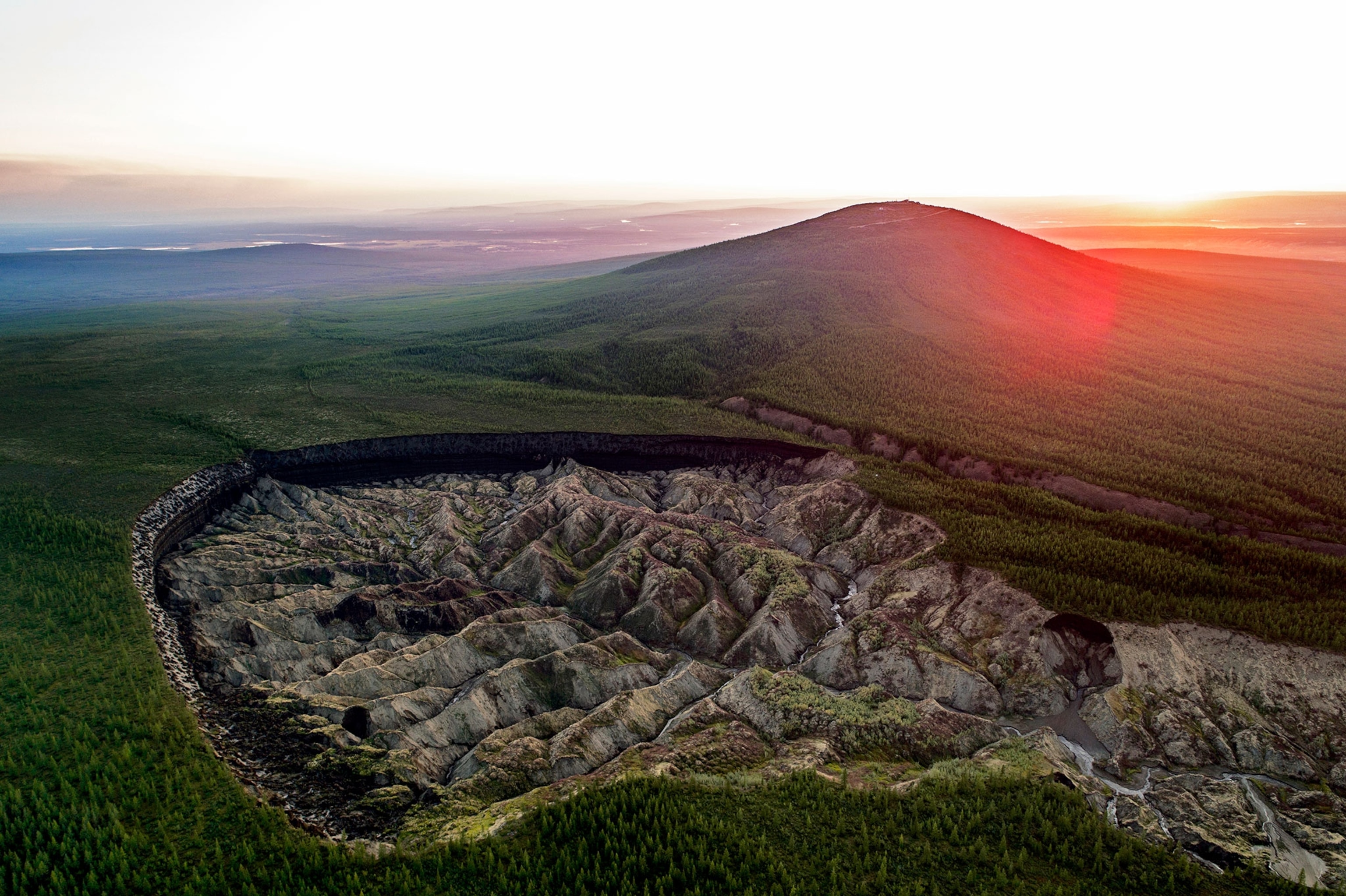 the Batagaika Crater in the Siberian town of Batagay, Russia.