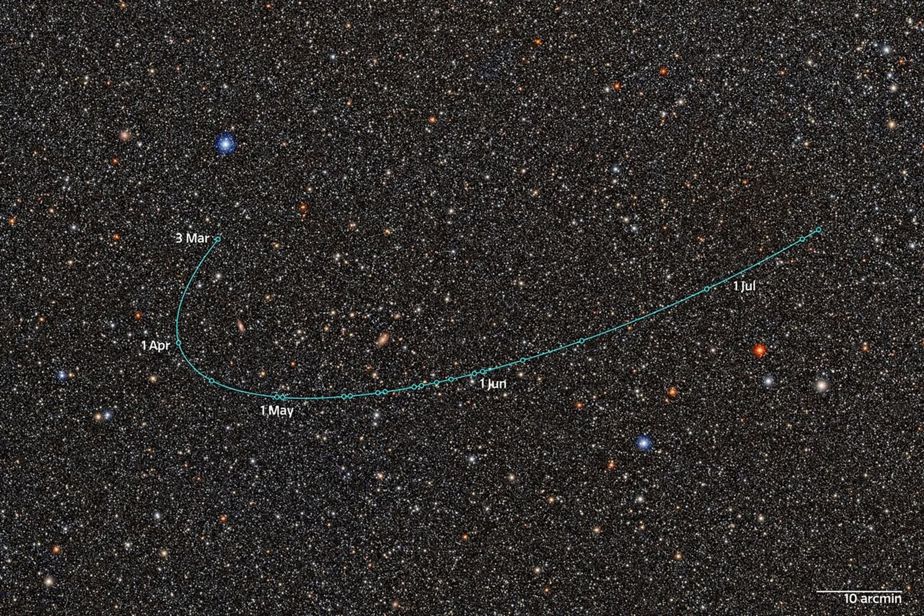 Small bright, multi-colored points against a dark sky in space