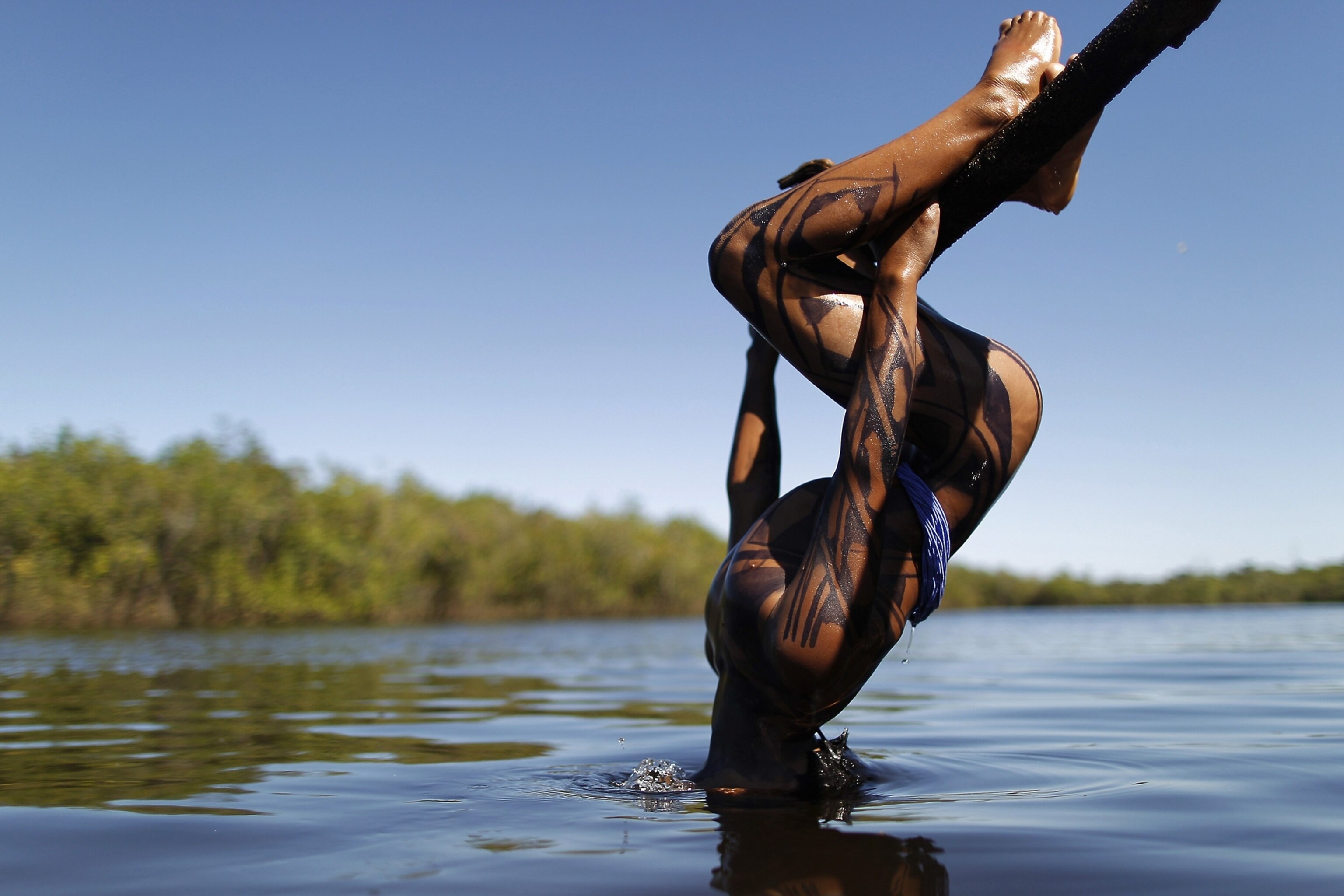 Amazon rainforest picture: Indian boy on Xingu River in one of the best pictures of May 2012