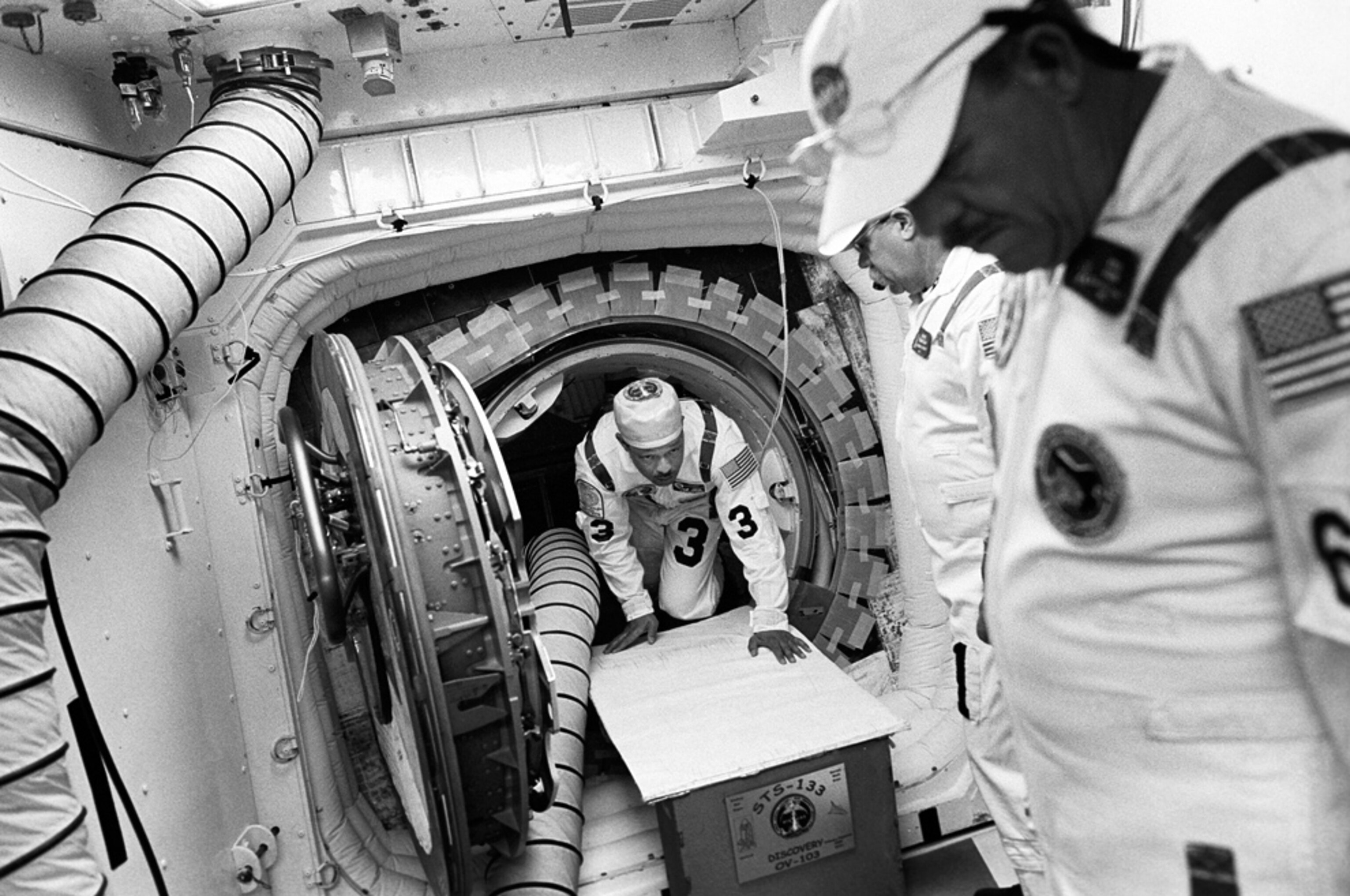 members of the closeout crew during a practice for launch