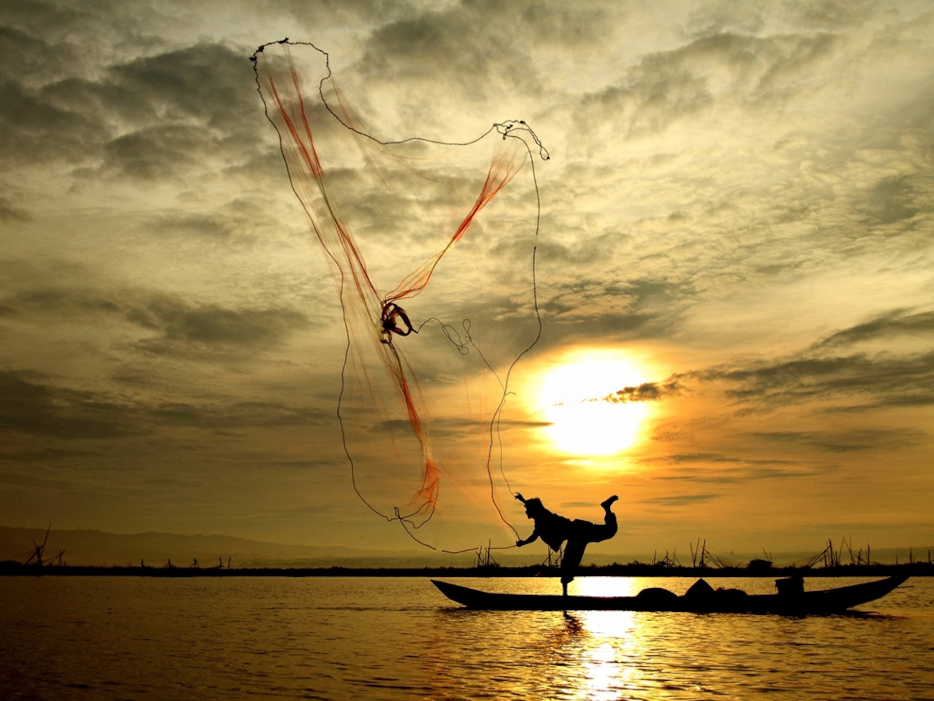 Fisherman at sunset