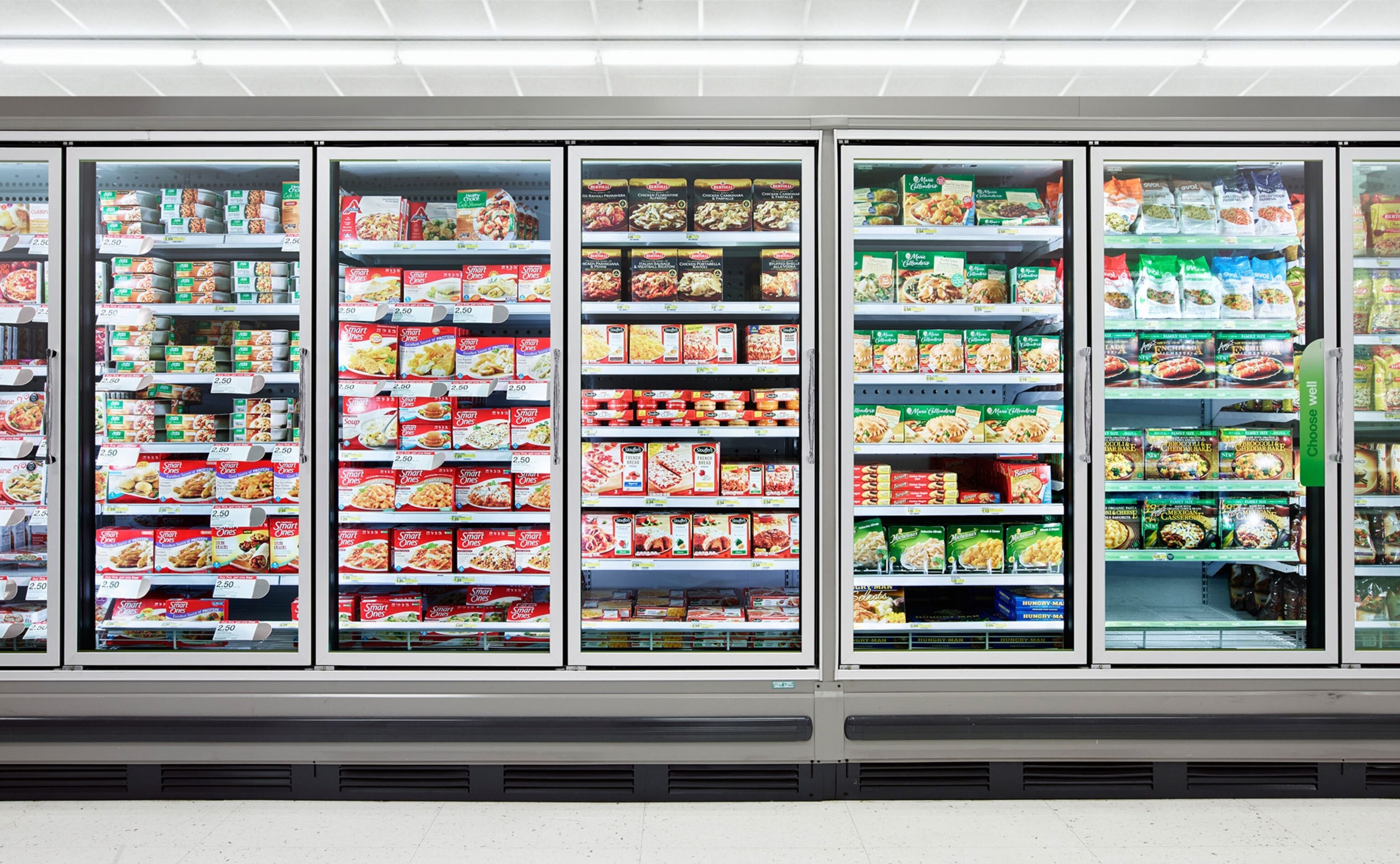 the freezer aisle in a grocery store, photographed straight on