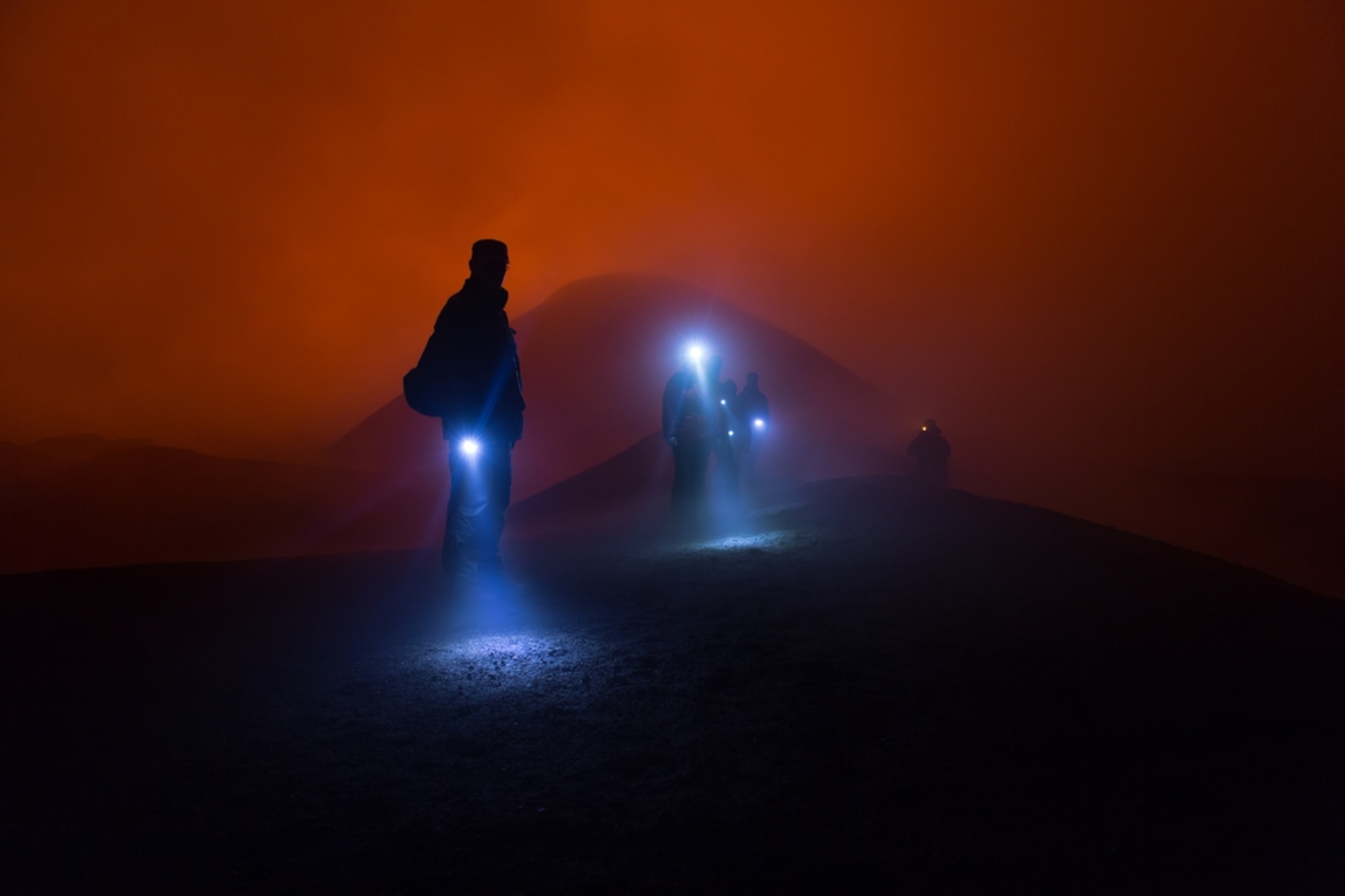 people climbing a volcano in Russia