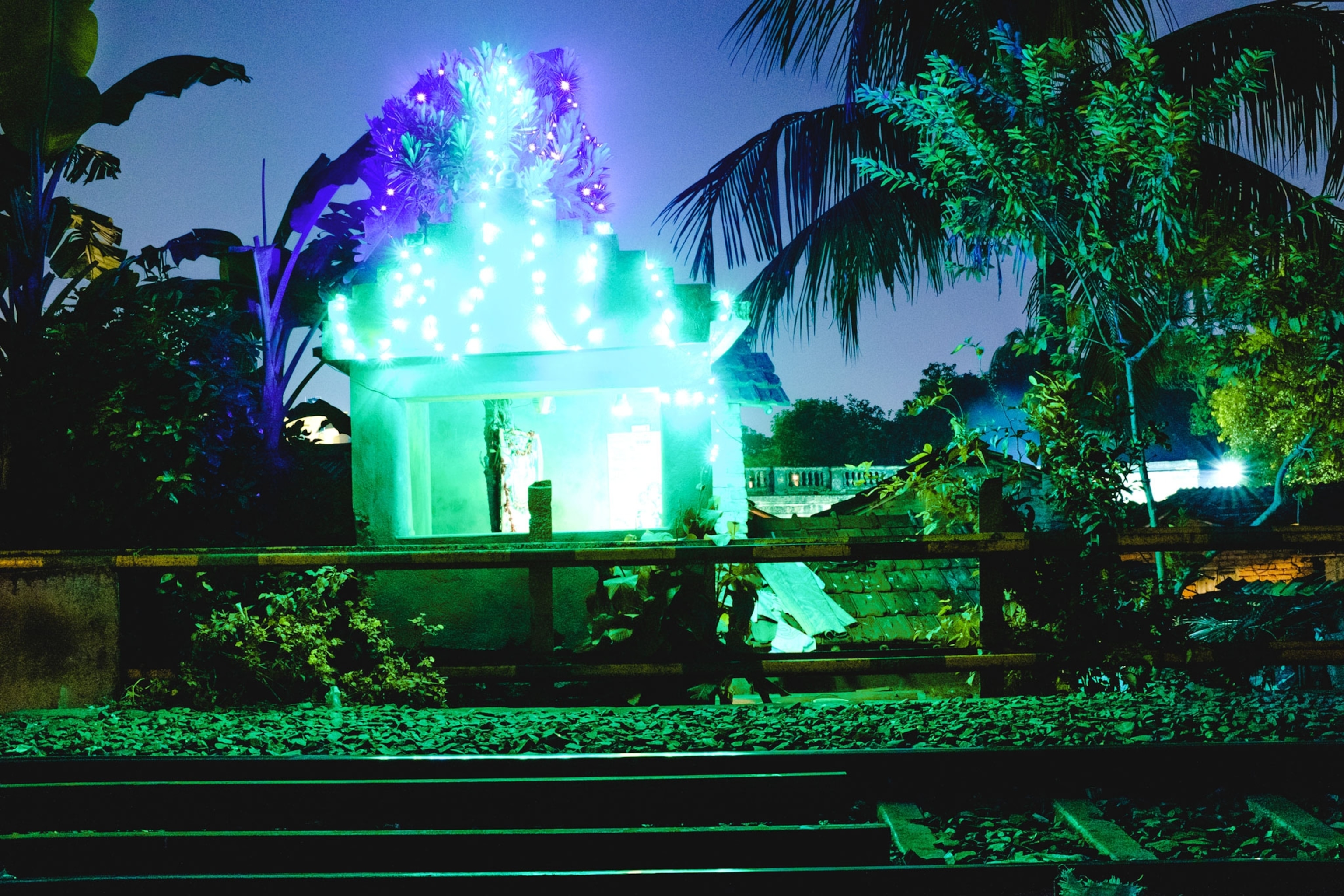 a temple illuminated with lights
