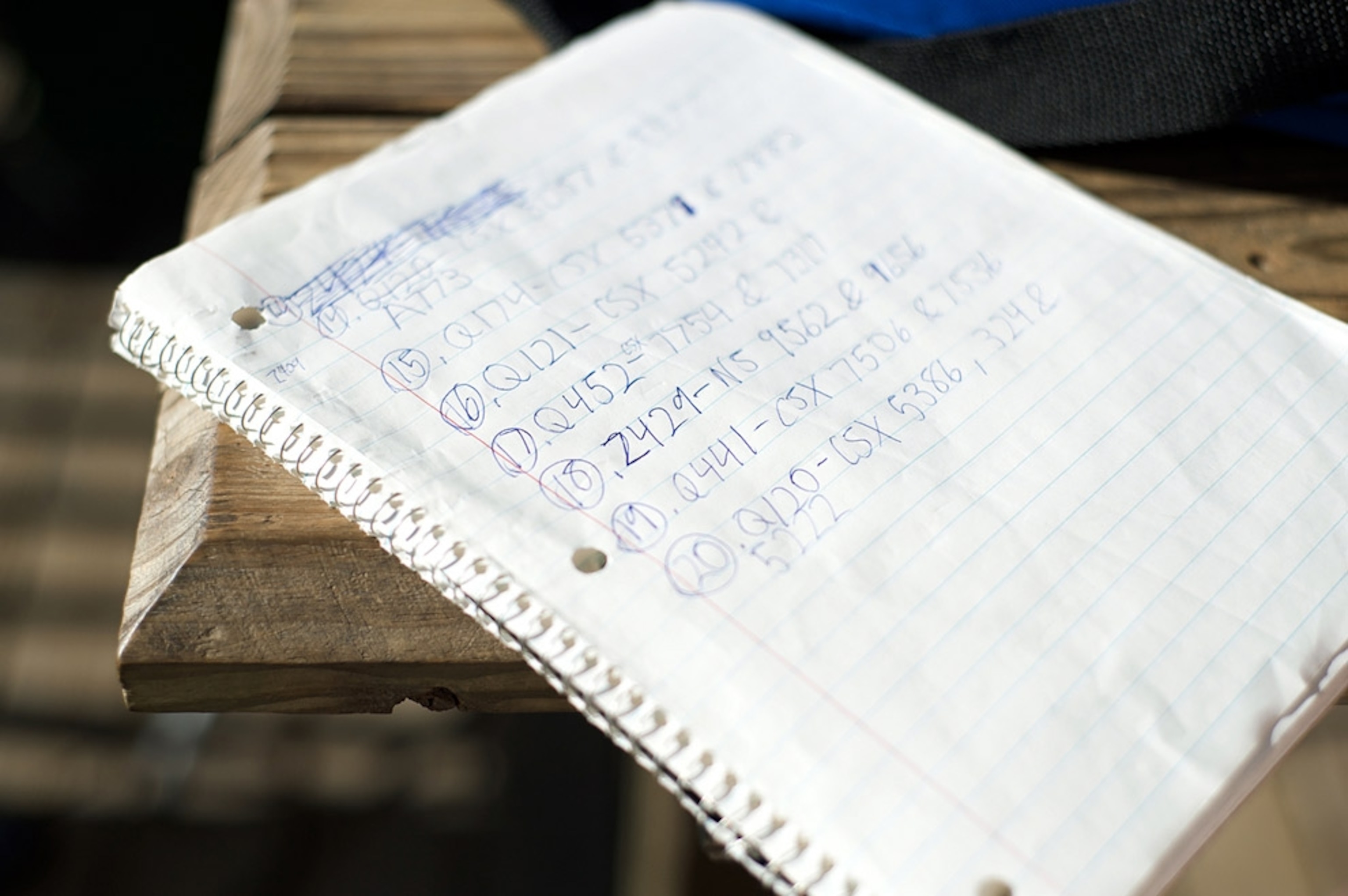 Notebook page with numbers listed