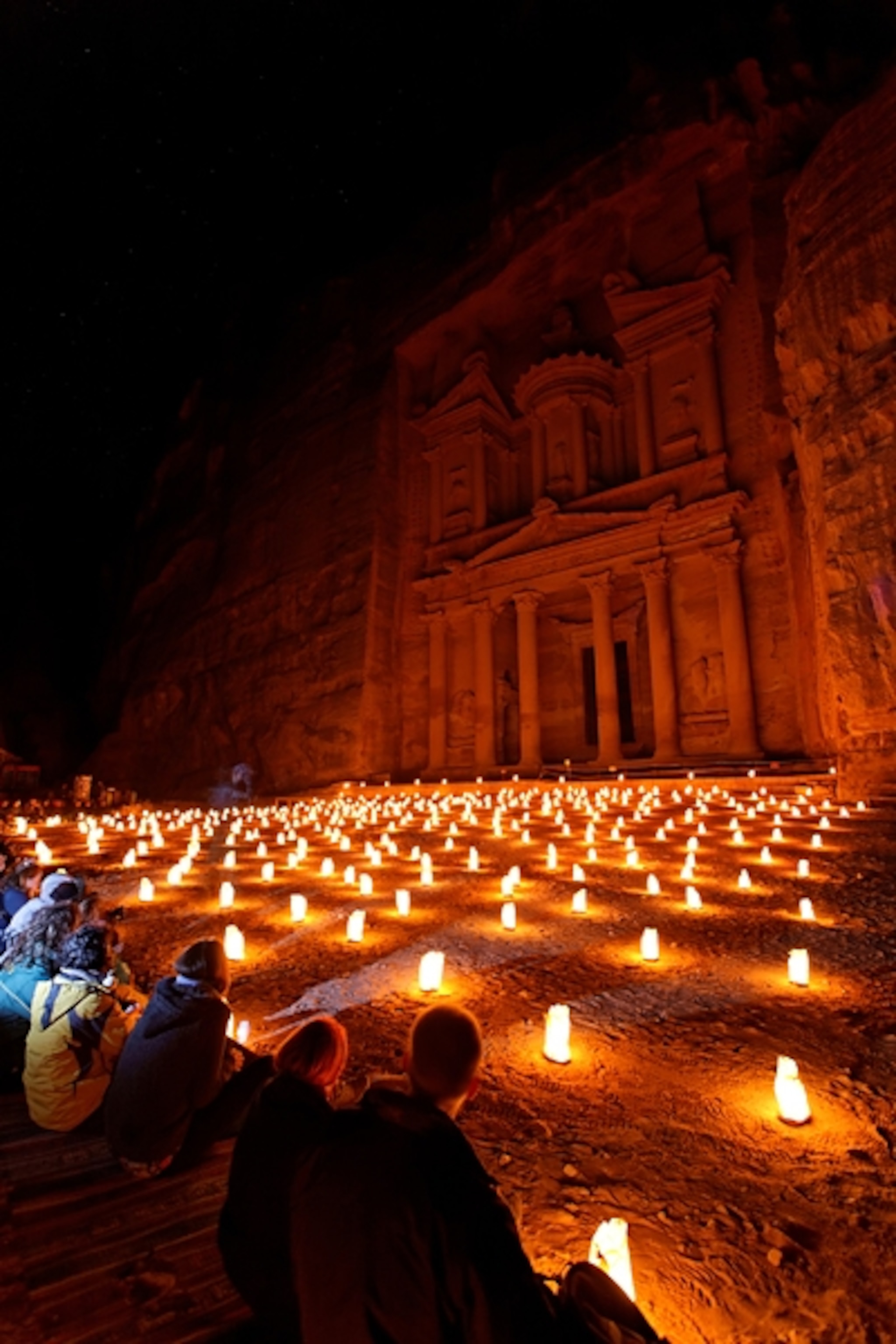 Petra, Jordan, at night with lighted lanterns