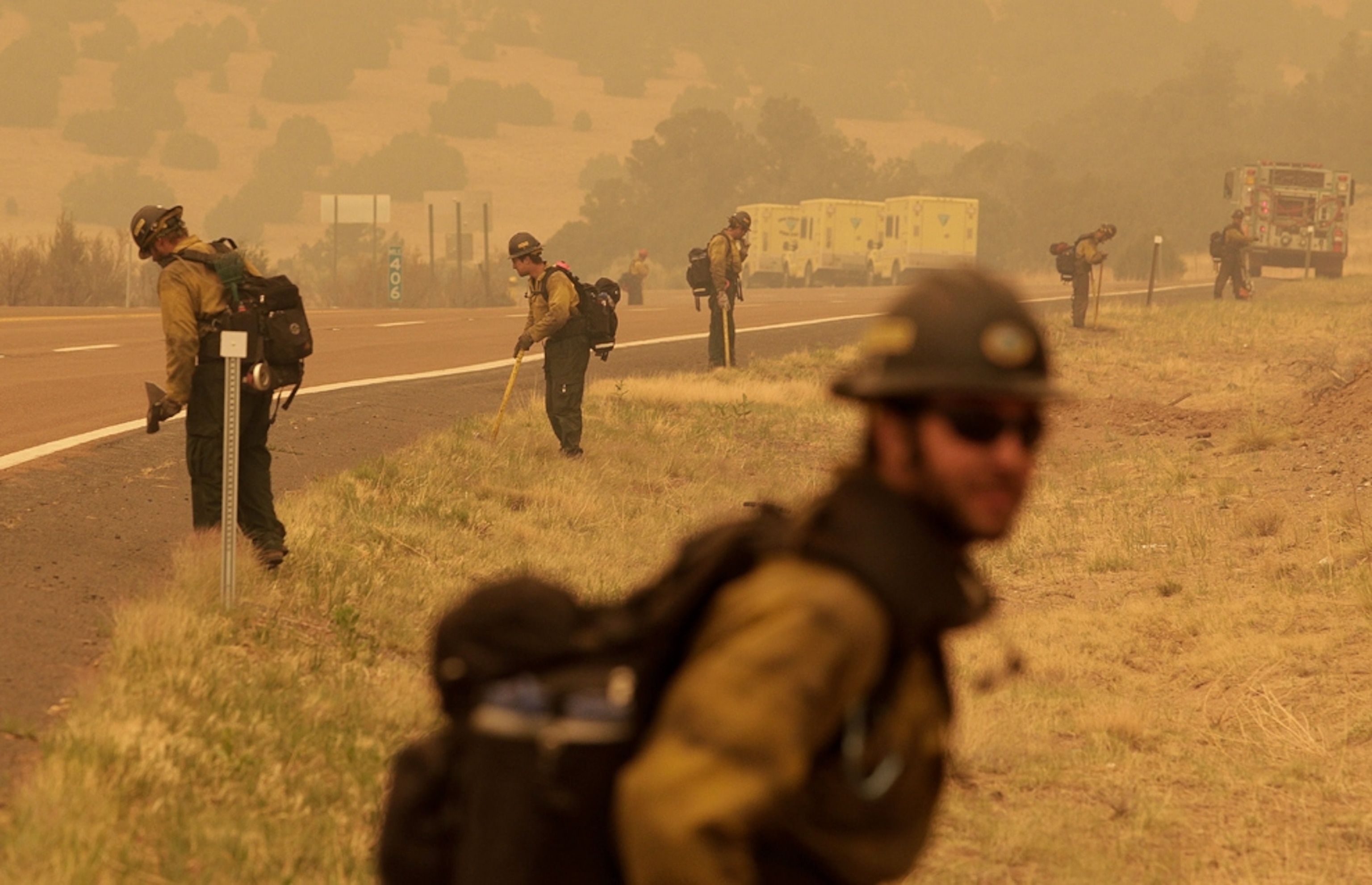 firefighters holding the fire line of the Arizona wildfire