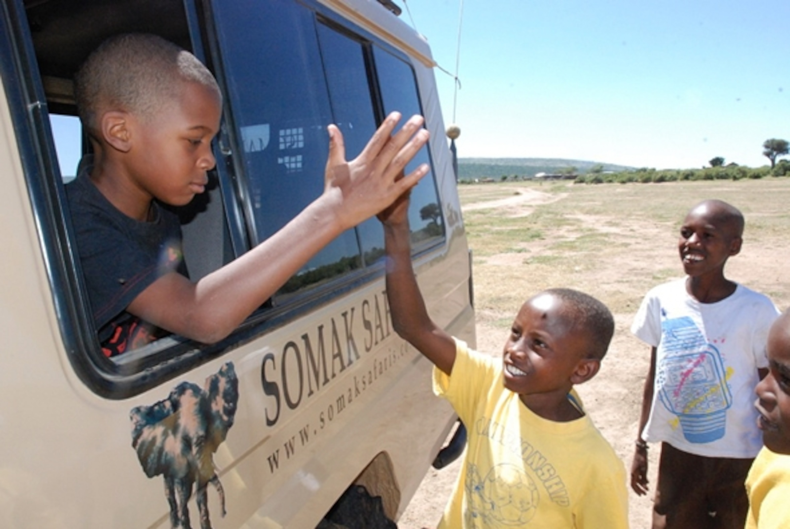 Making new friends in Kenya. (Photograph by Heather Davis)