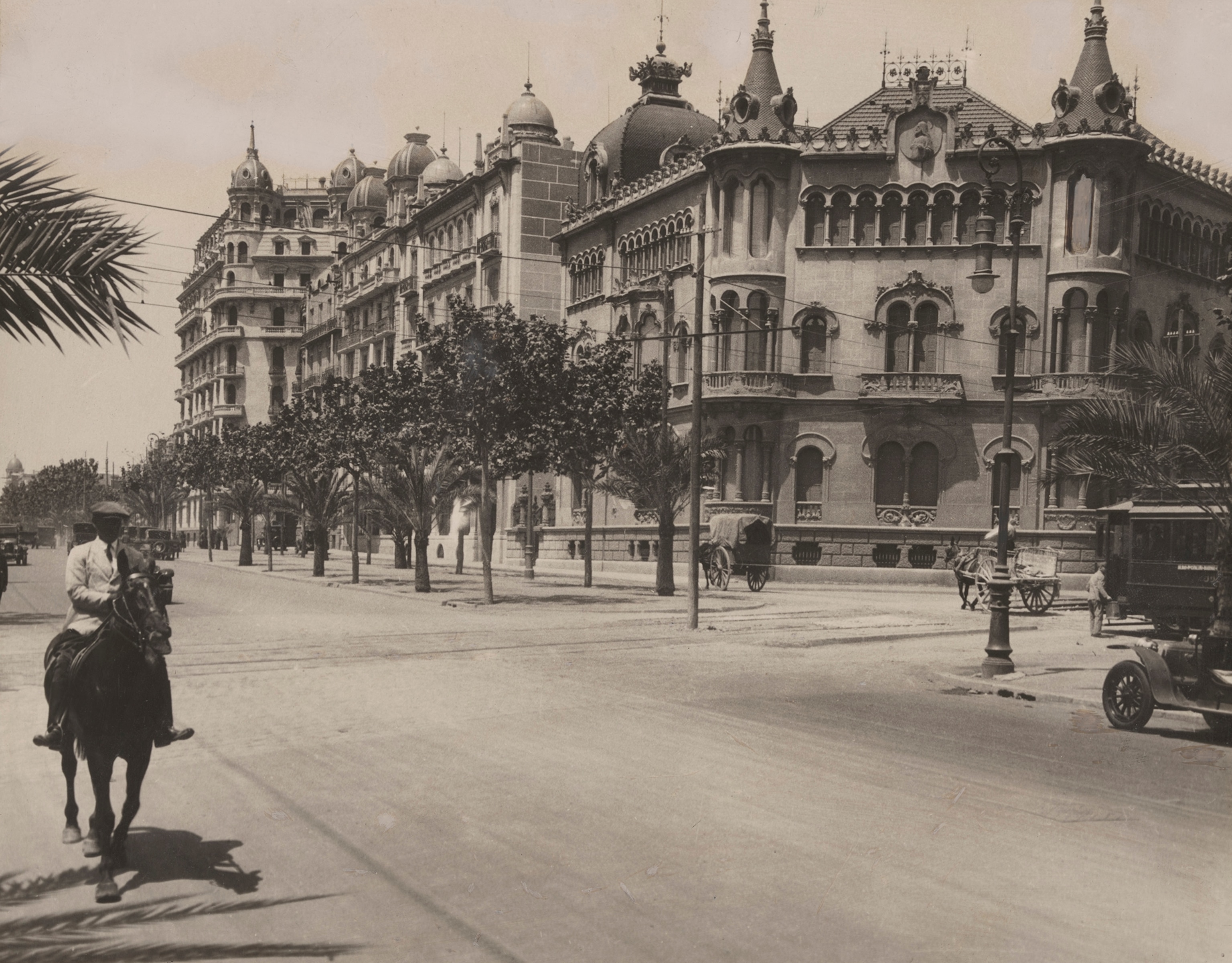 A person rides a horse where the via diagonal intersects the new town form southeast to northwest.