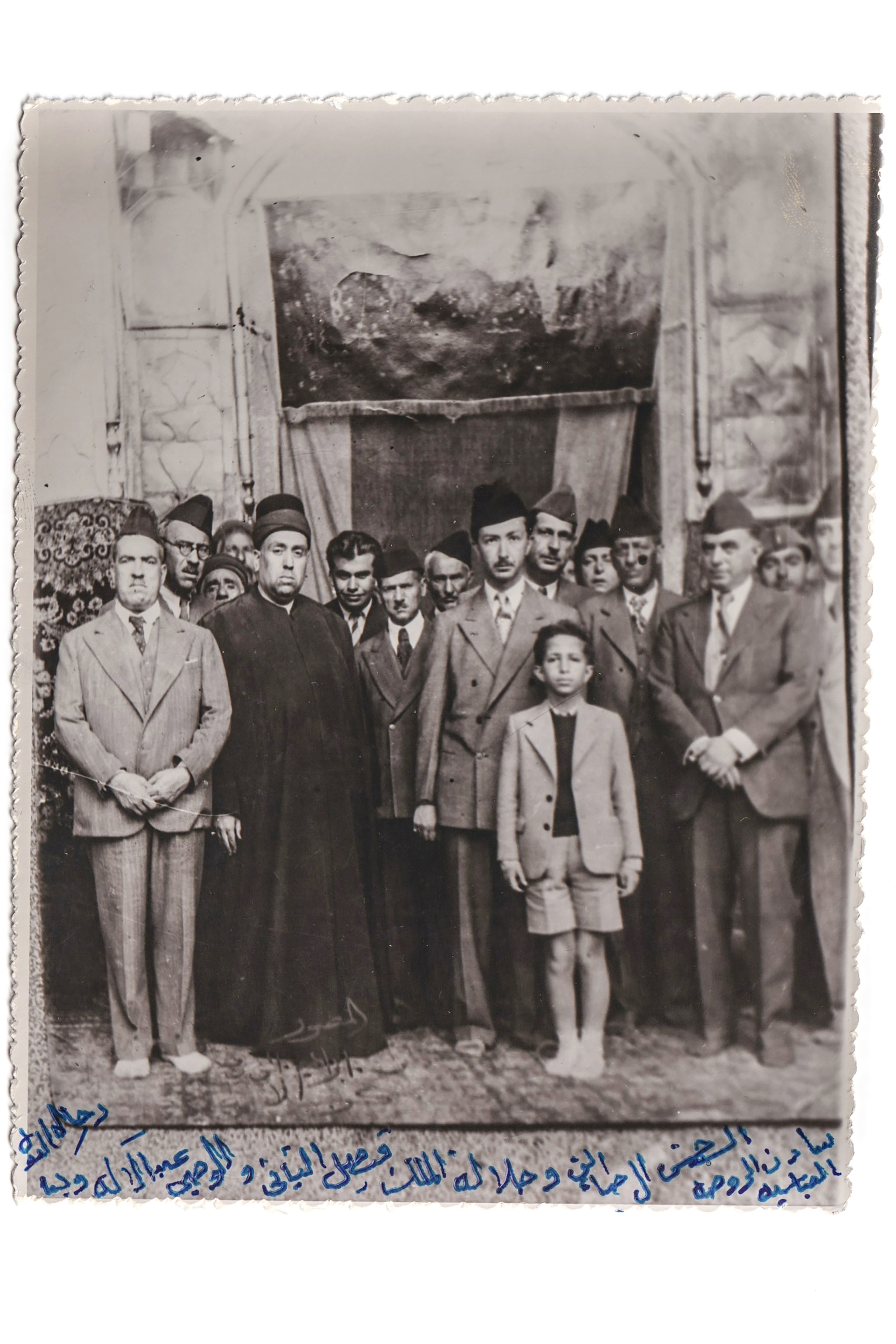 A black and white photograph of a group of men