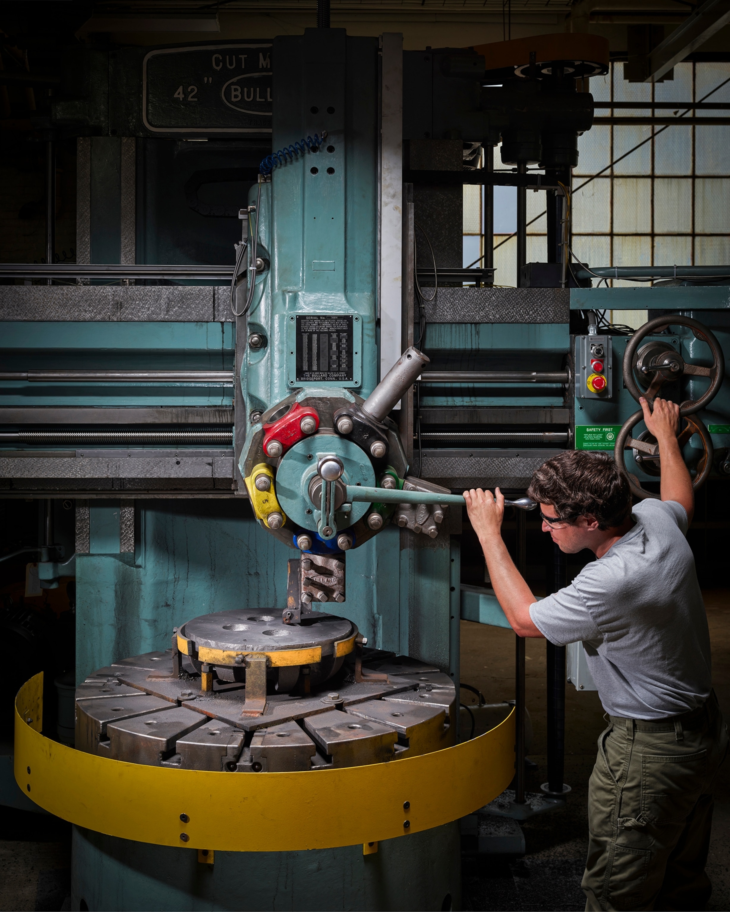 Waterford shop, machining of a cast steel socket for miter gates on a vertical turret lathe, Erie Canal, New York.