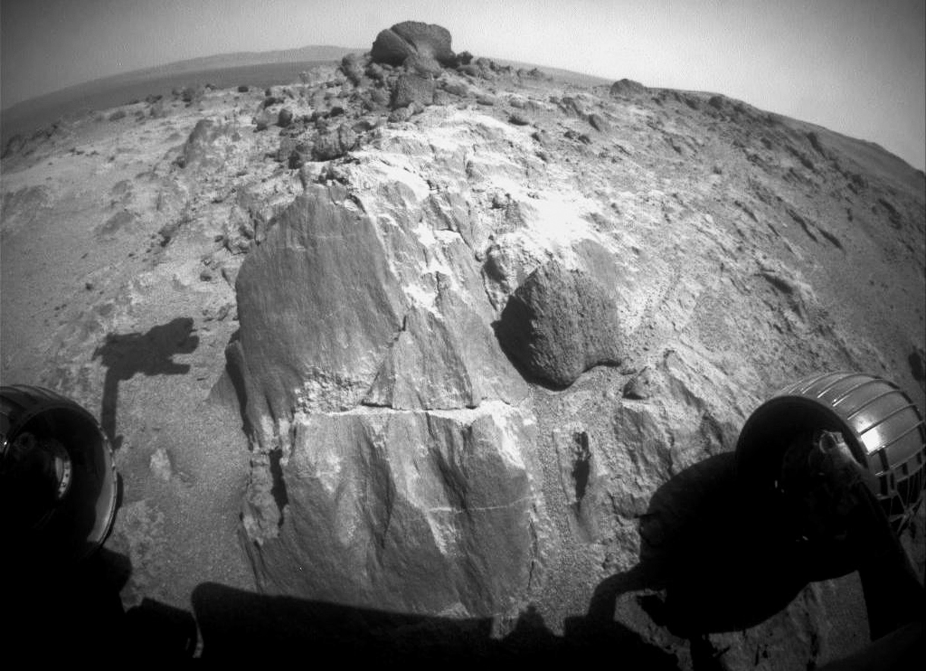 the flat-faced rock surface of Mars