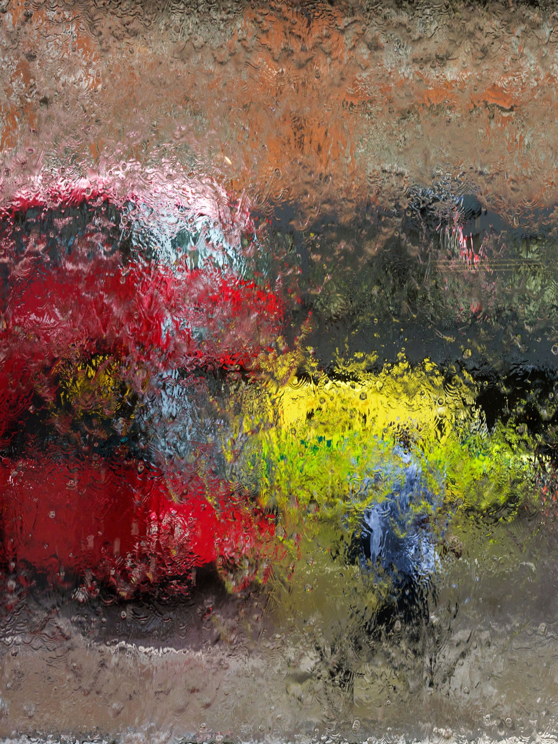 a bus through a rainy window