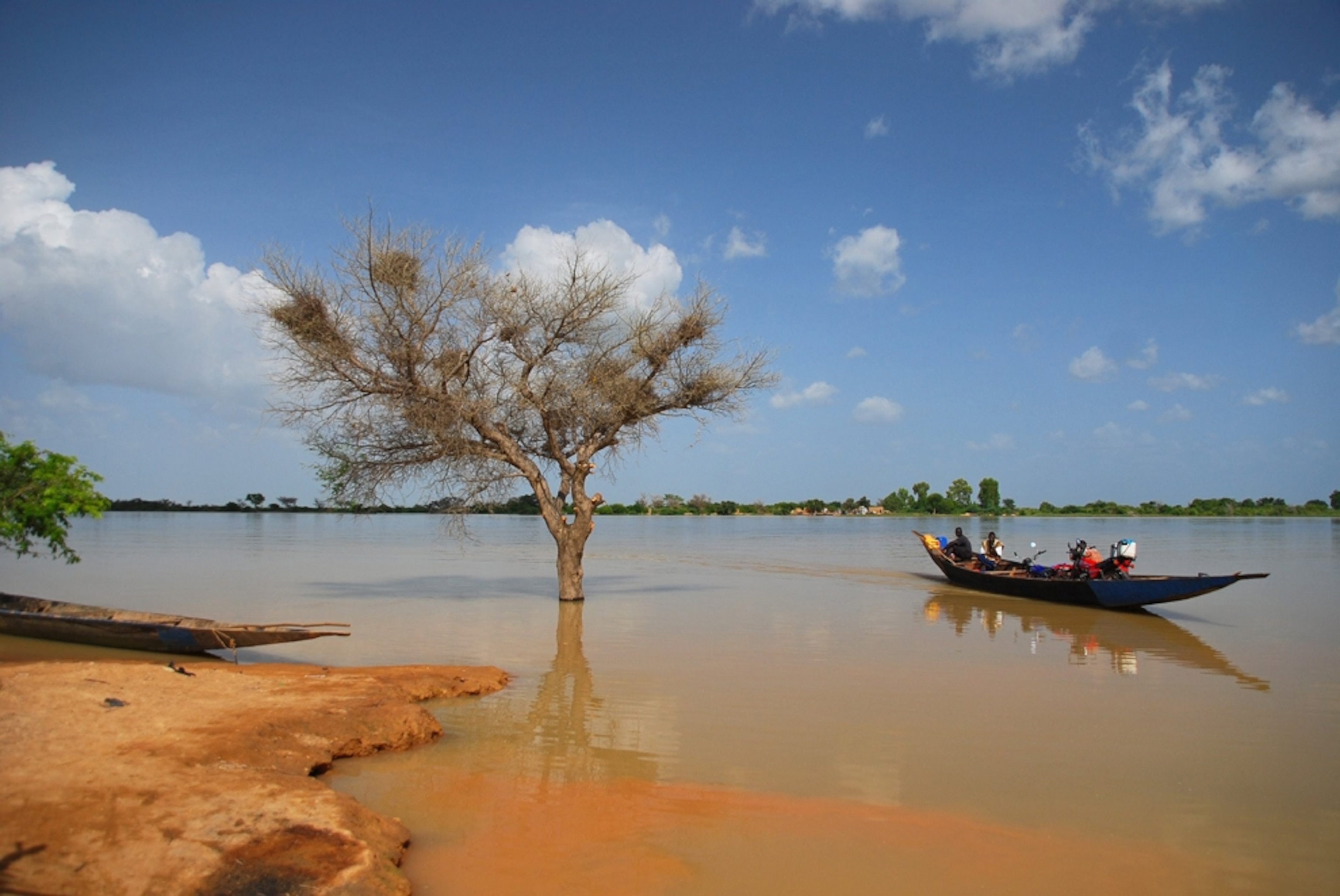 Sandstone rock with boats