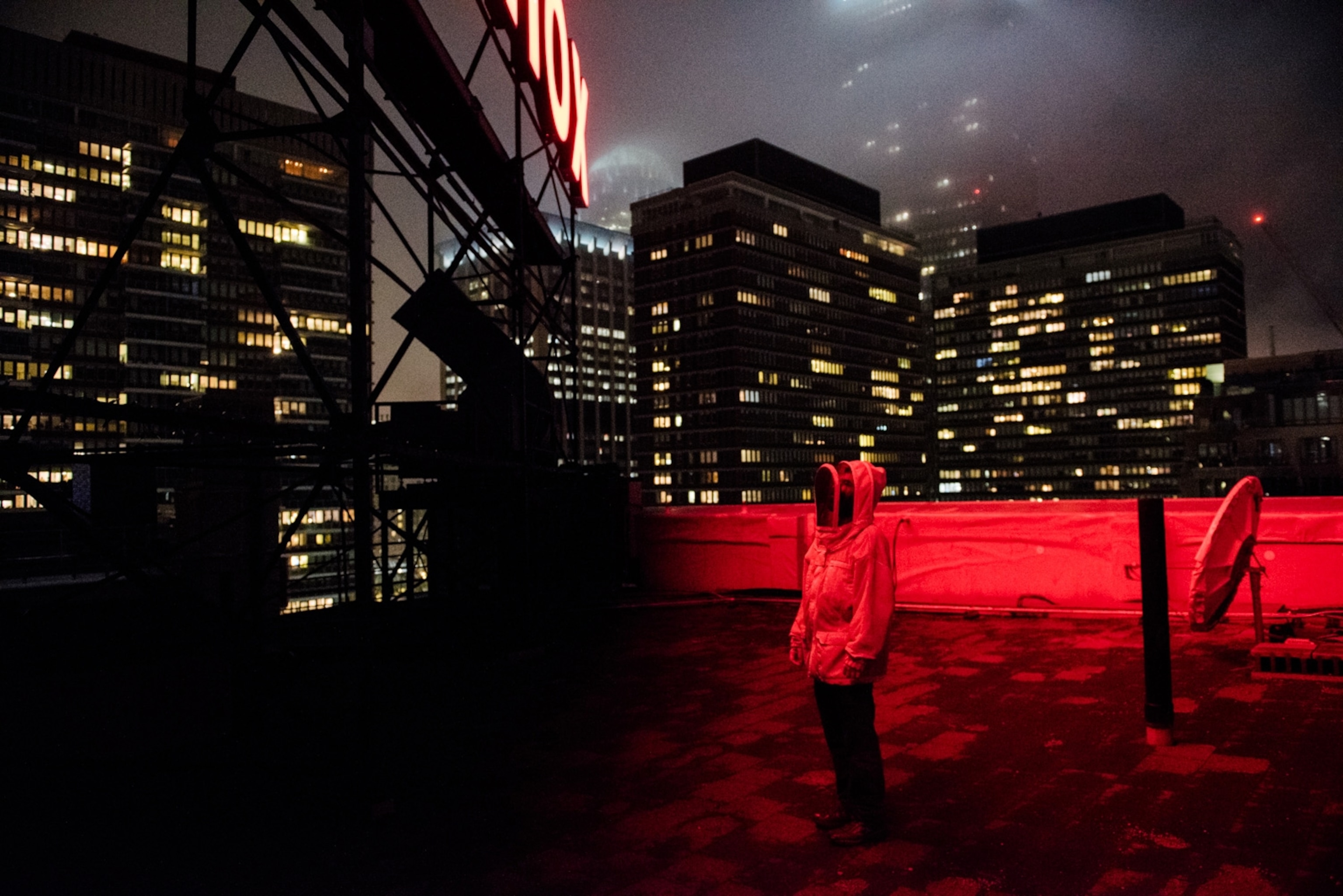 Part-time beekeeper Dean Stiglitz cares for bees on the roof of the Lenox Hotel in Boston. The honey features in dishes served in the hotel's upscale restaurants.