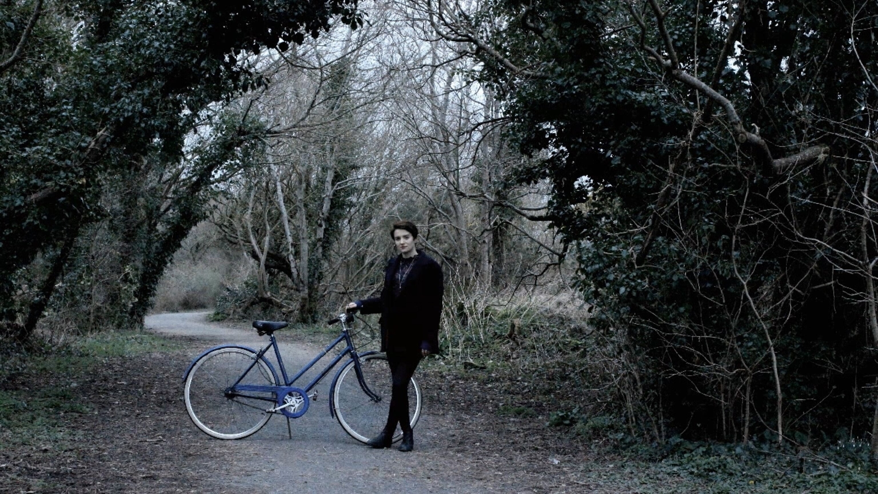 young woman and bicycle