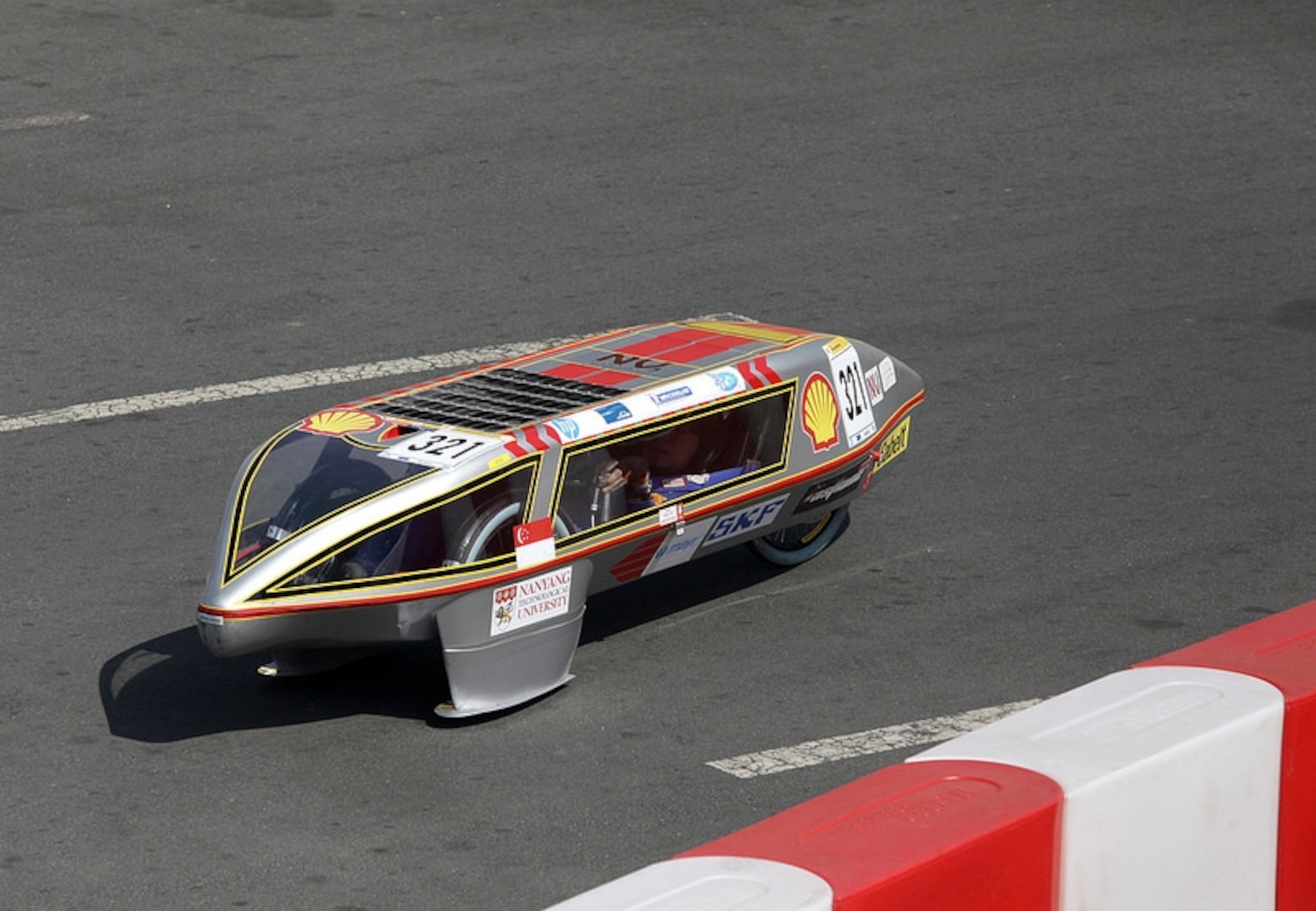 The E-drive team from Singapore’s Nanyang Technological University won the technical innovation award for use of an electromagnetic clutch to eliminate drive-train losses while coasting.Photograph byJake Verzosa/AP Images for Shell.