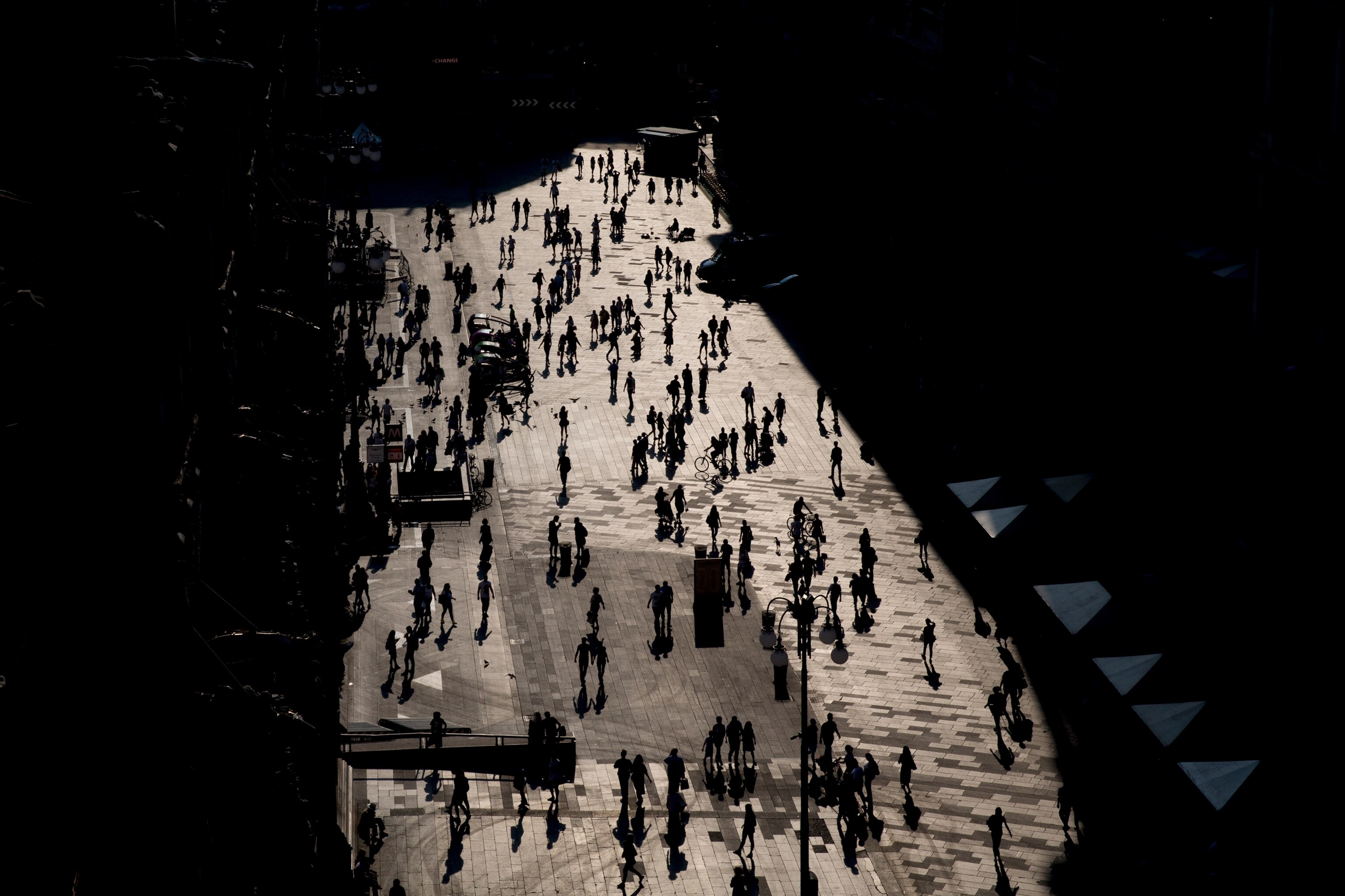 a view of Piazza Duomo from the top of the cathedral terrace in Milan, Italy