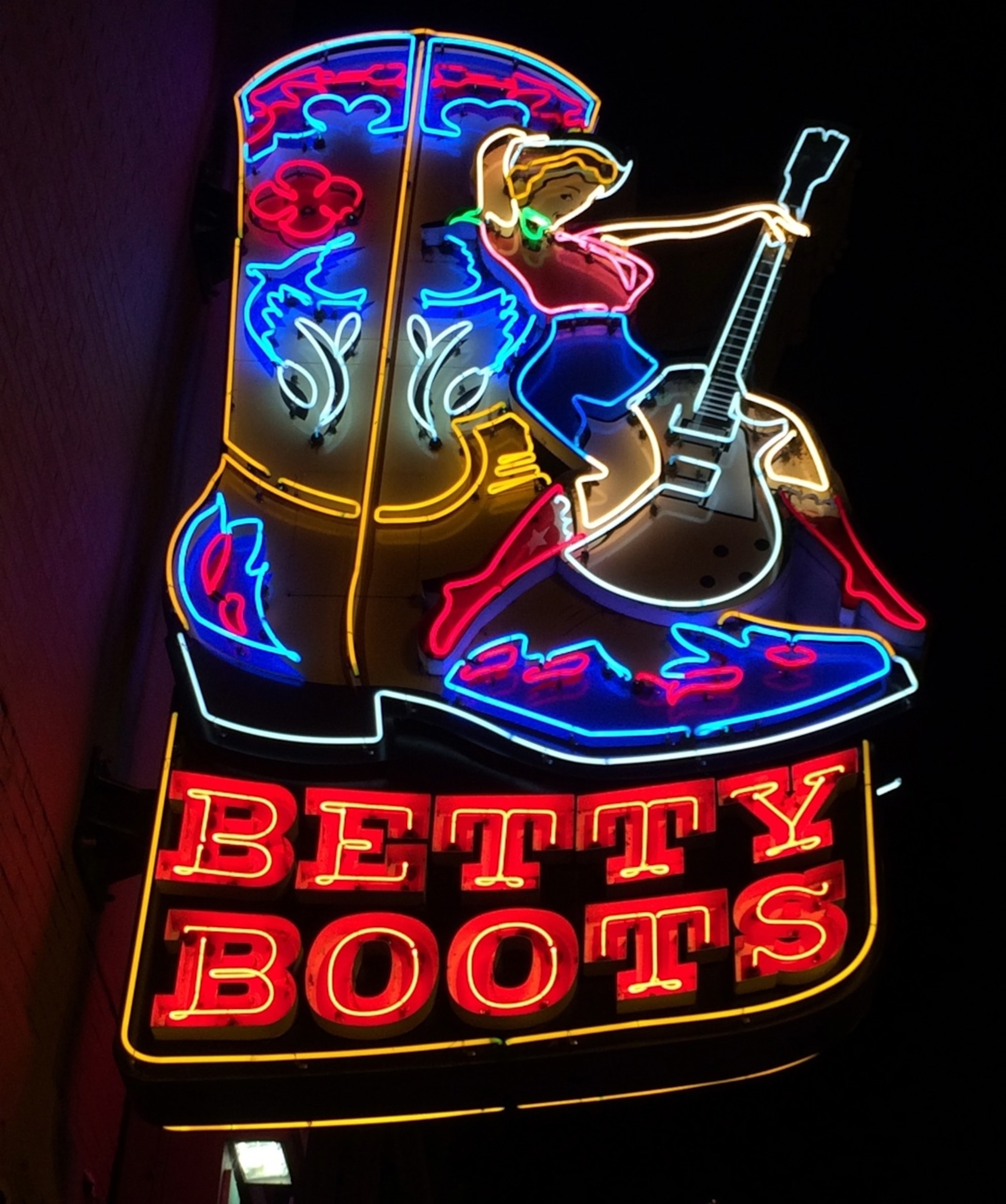 Bright lights on Nashville's Broadway. (Photo by Andrew Evans, National Geographic Travel)