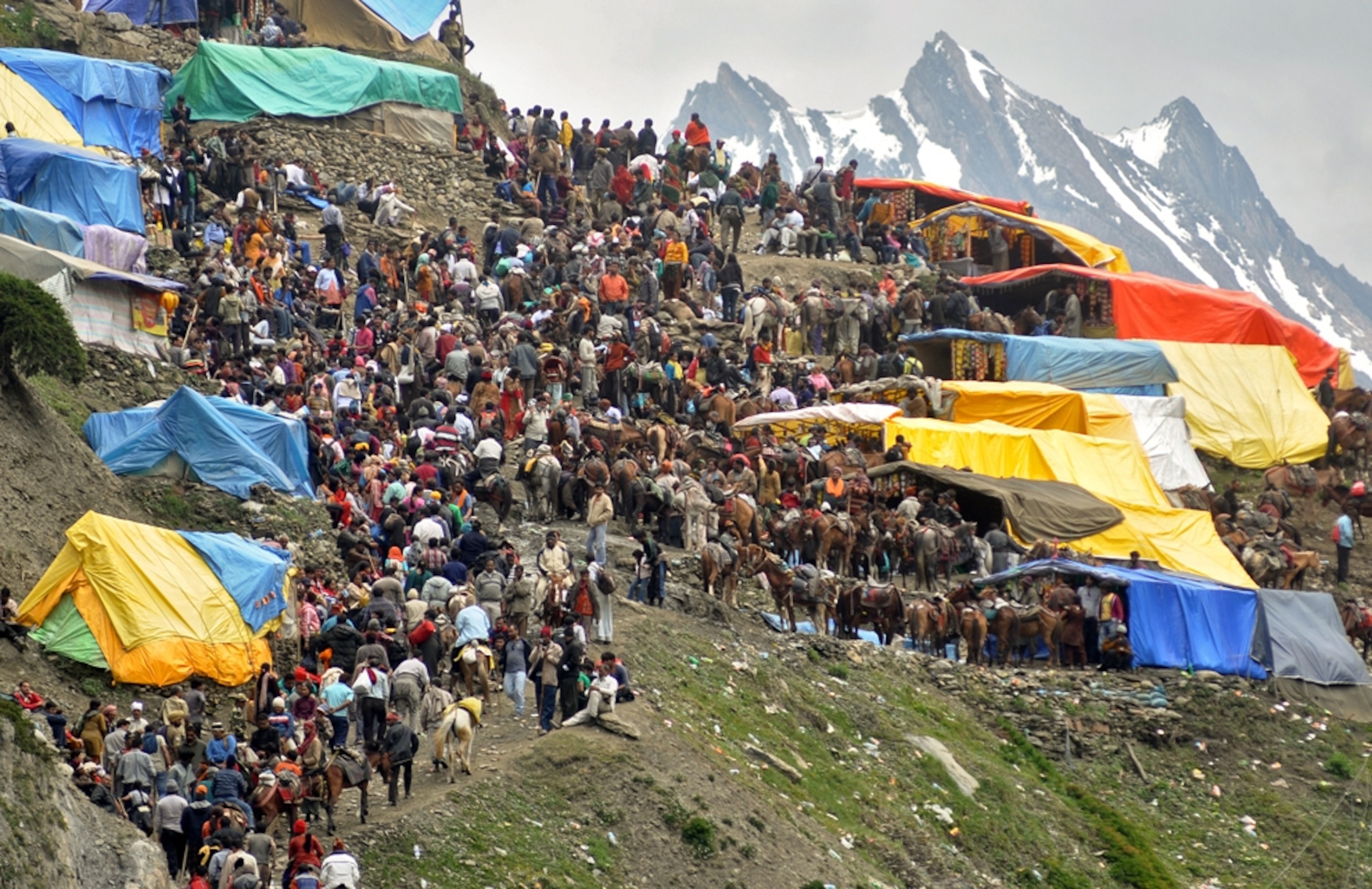 Hindu pilgrims make their pilgrimage to the sacred Amarnath cave near Baltal, Jammu and Kashmir, India.