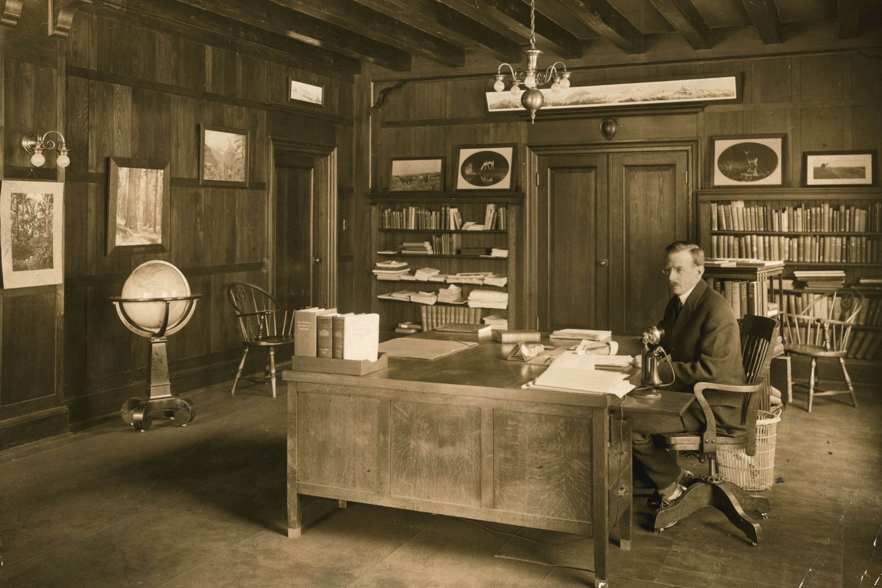 a man sitting at his desk in an office