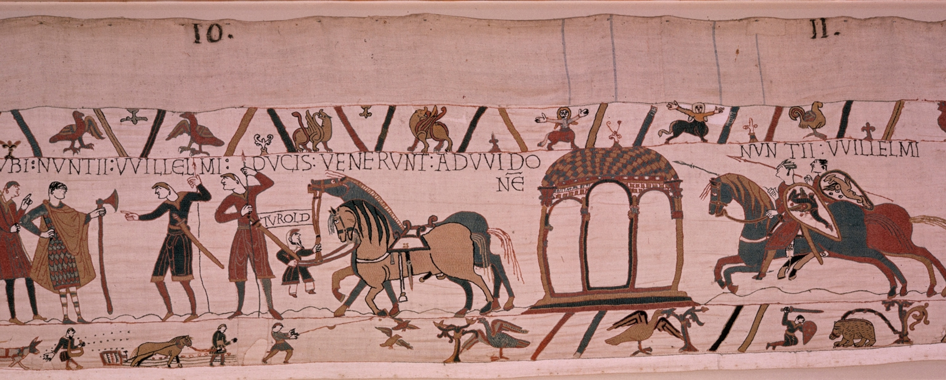 Duke William orders Harold's release in scene from Bayeux Tapestry.