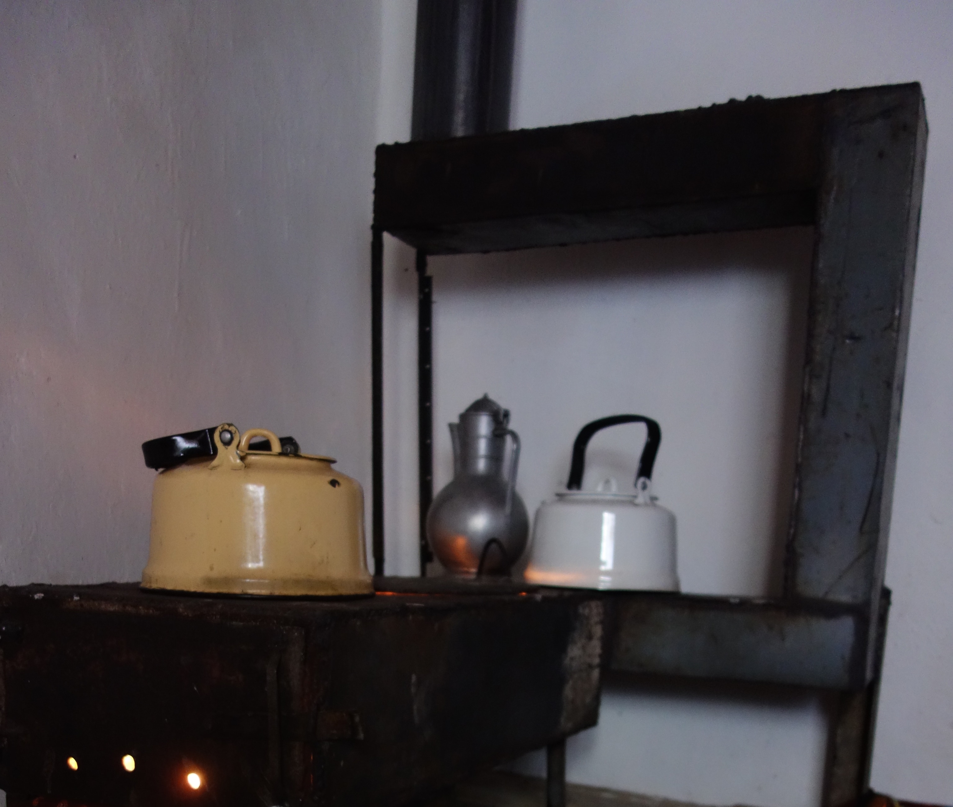 Because of energy rationing in winter, people in Tajikistan heat their homes by burning coal in a a pichka, the traditional cast iron stove. (Joe Shottenfeld)