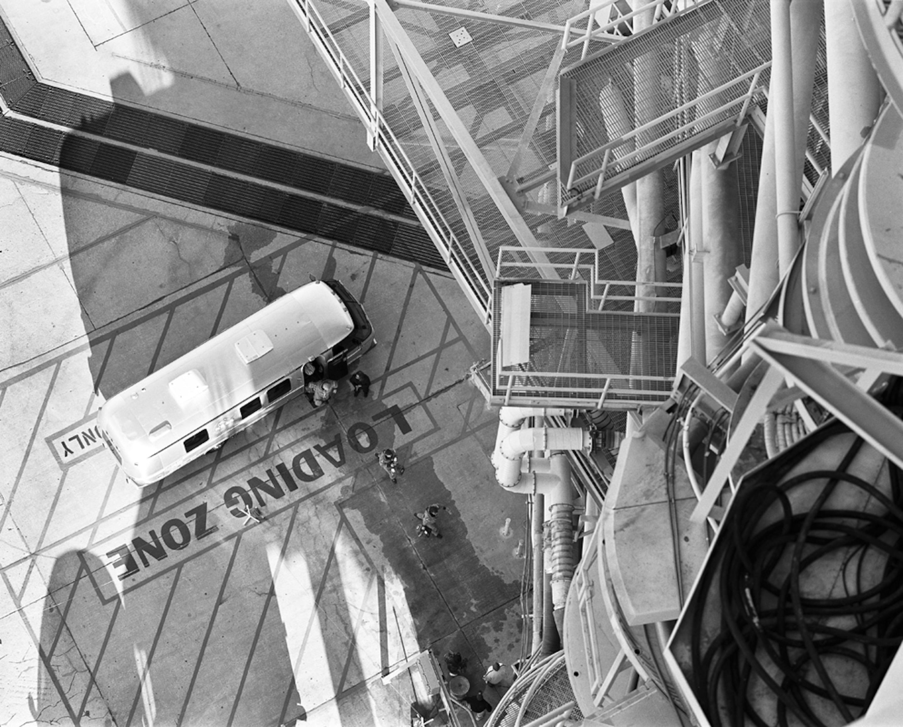 astronauts approaching the space shuttle during a practice run