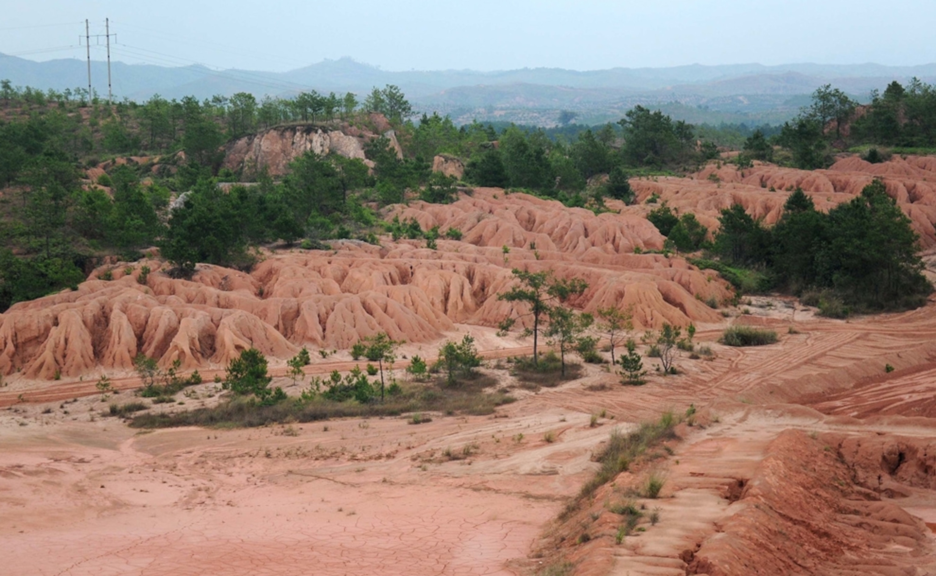 Pockmarked rare-earth mining landscape in Jiangxi Province