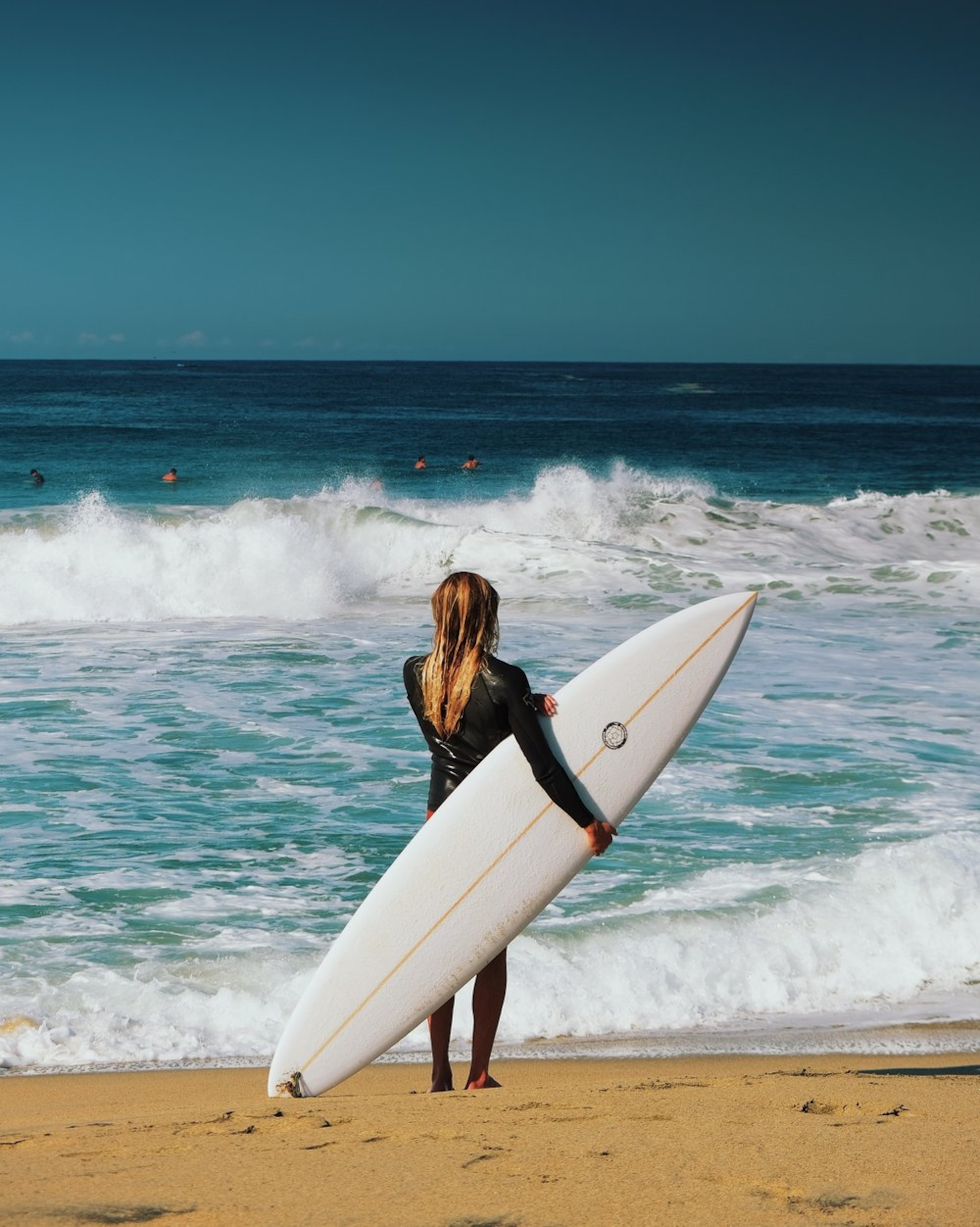 Surfer watching the waves at Playa Zicatela, in Puerto Escondido.