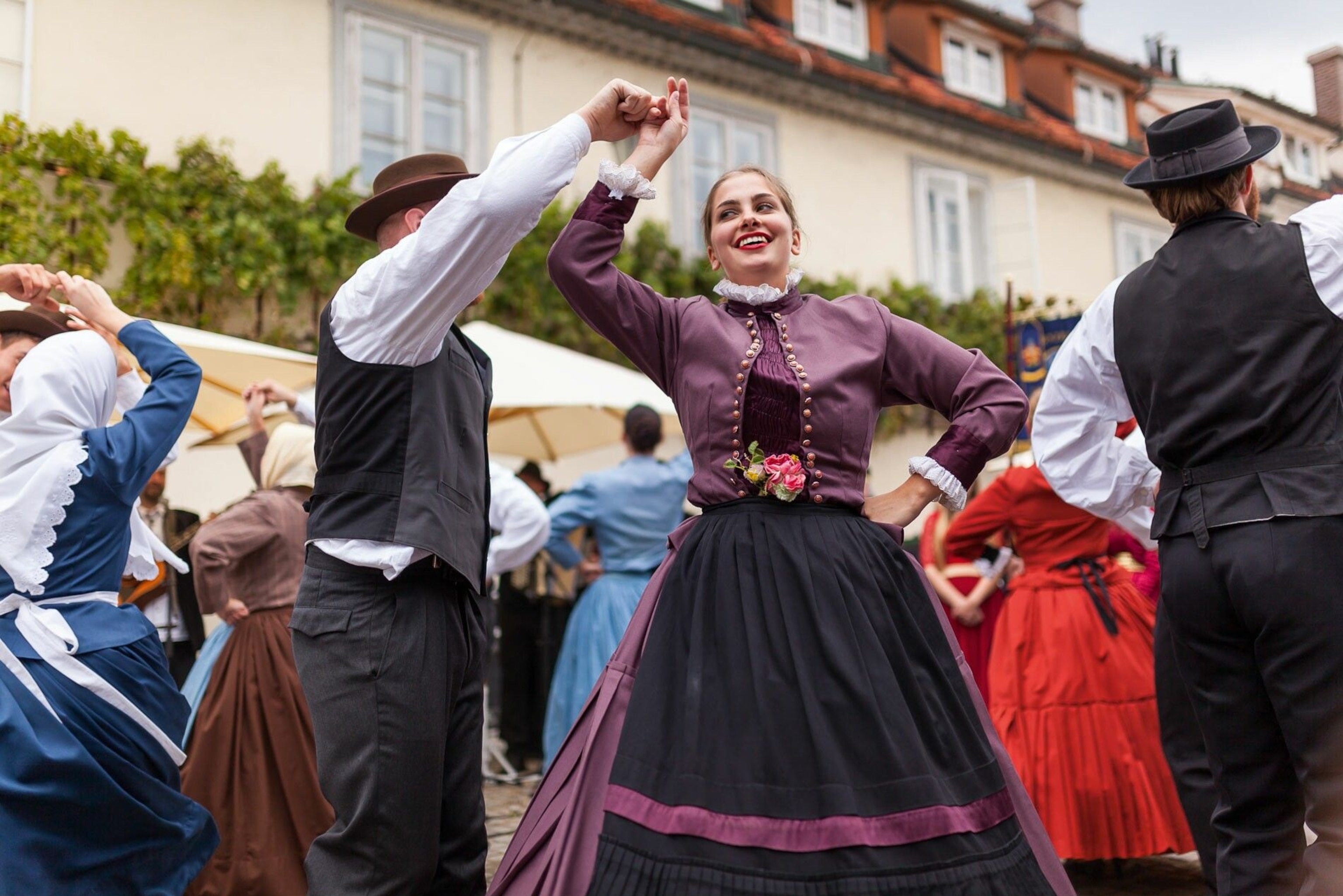 people dancing at a street event