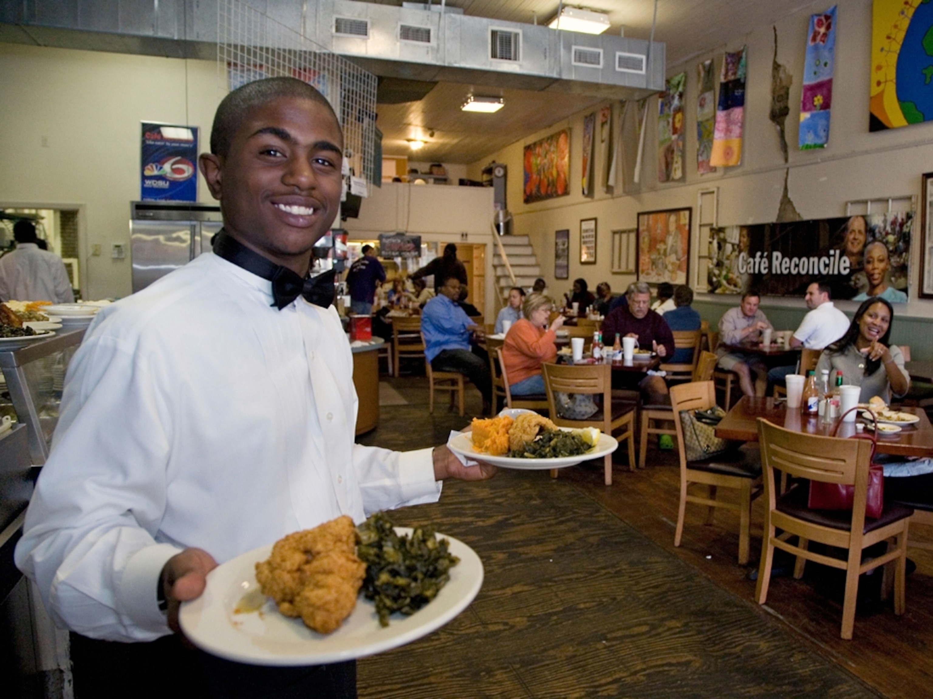 a waiter at Café Reconcile, New Orleans