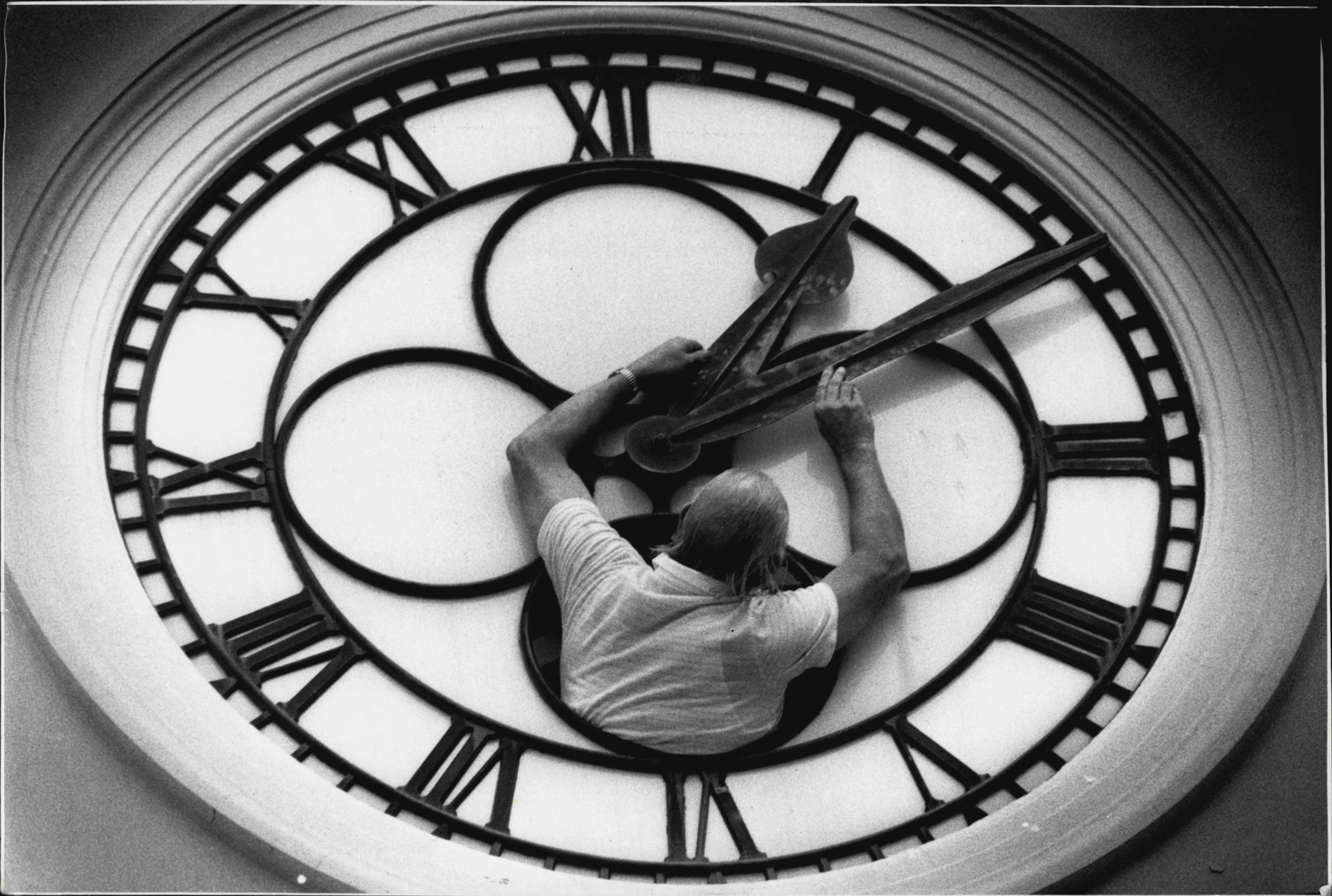 Lawrie Taprell, horologist, adjusting the North Sydney post office clock. March 17, 1989.