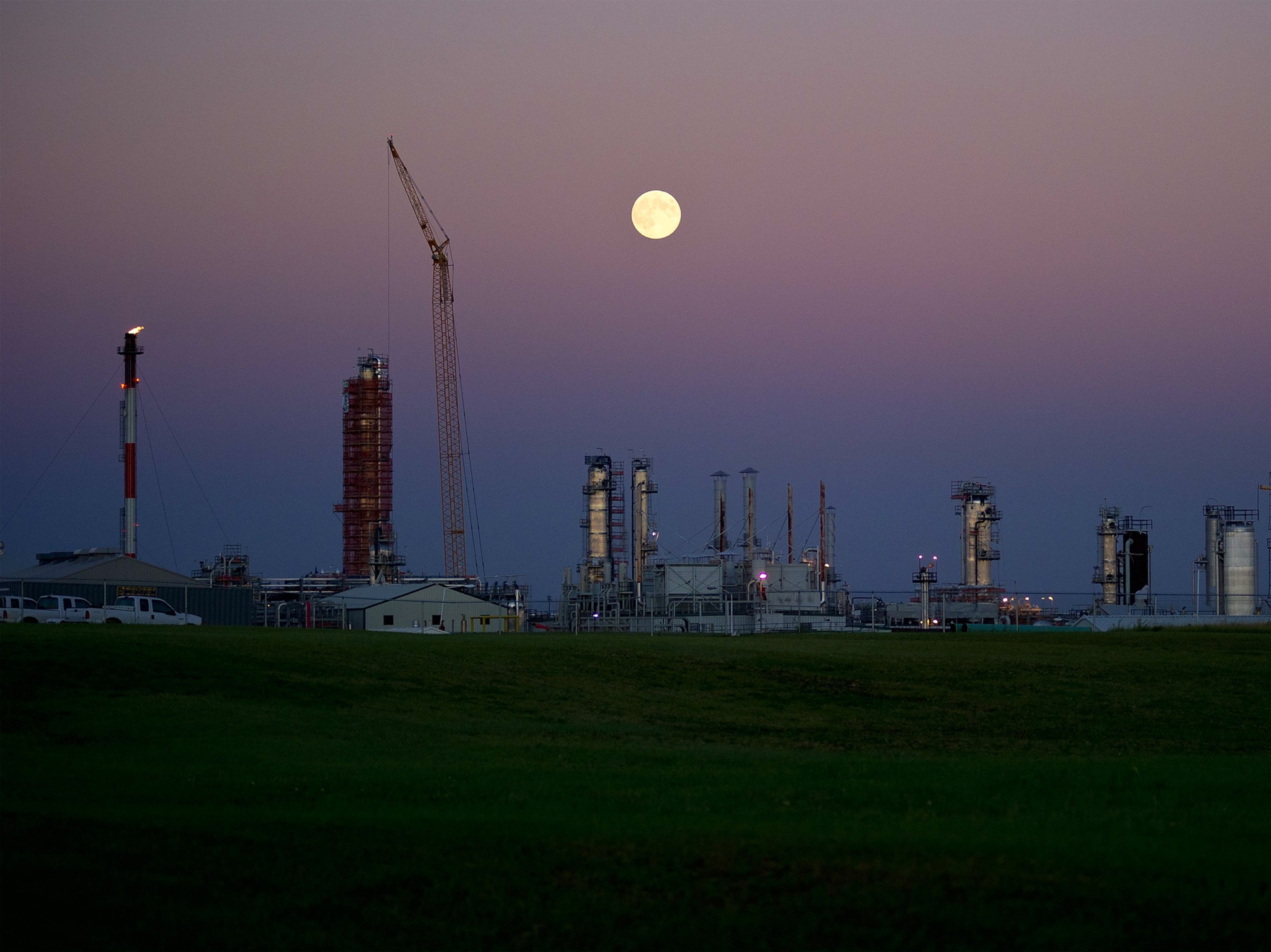 A natural gas plant in Tioga, North Dakota, at moonrise.