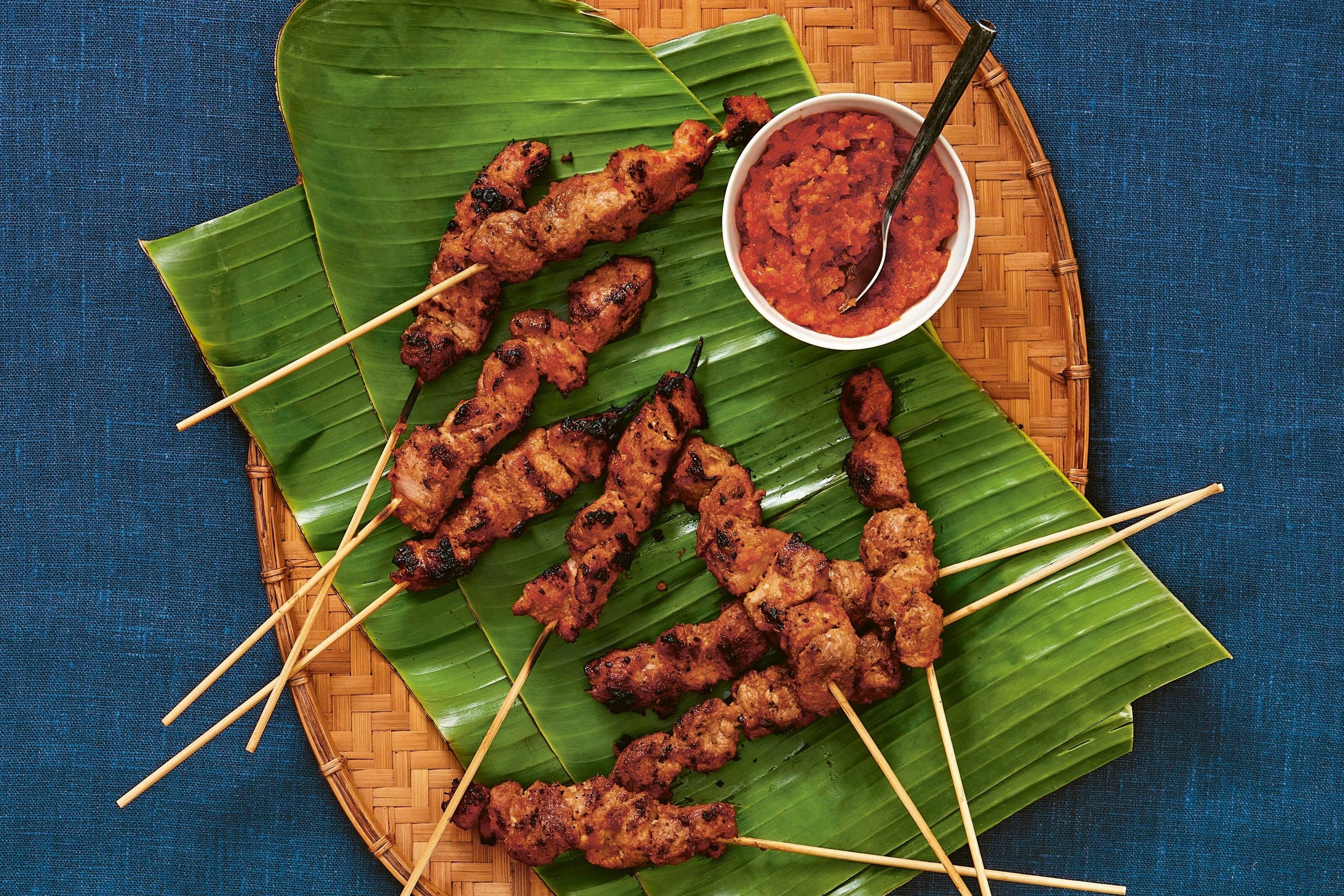 Pork satay skewers with spicy rica-rica dipping sauce.