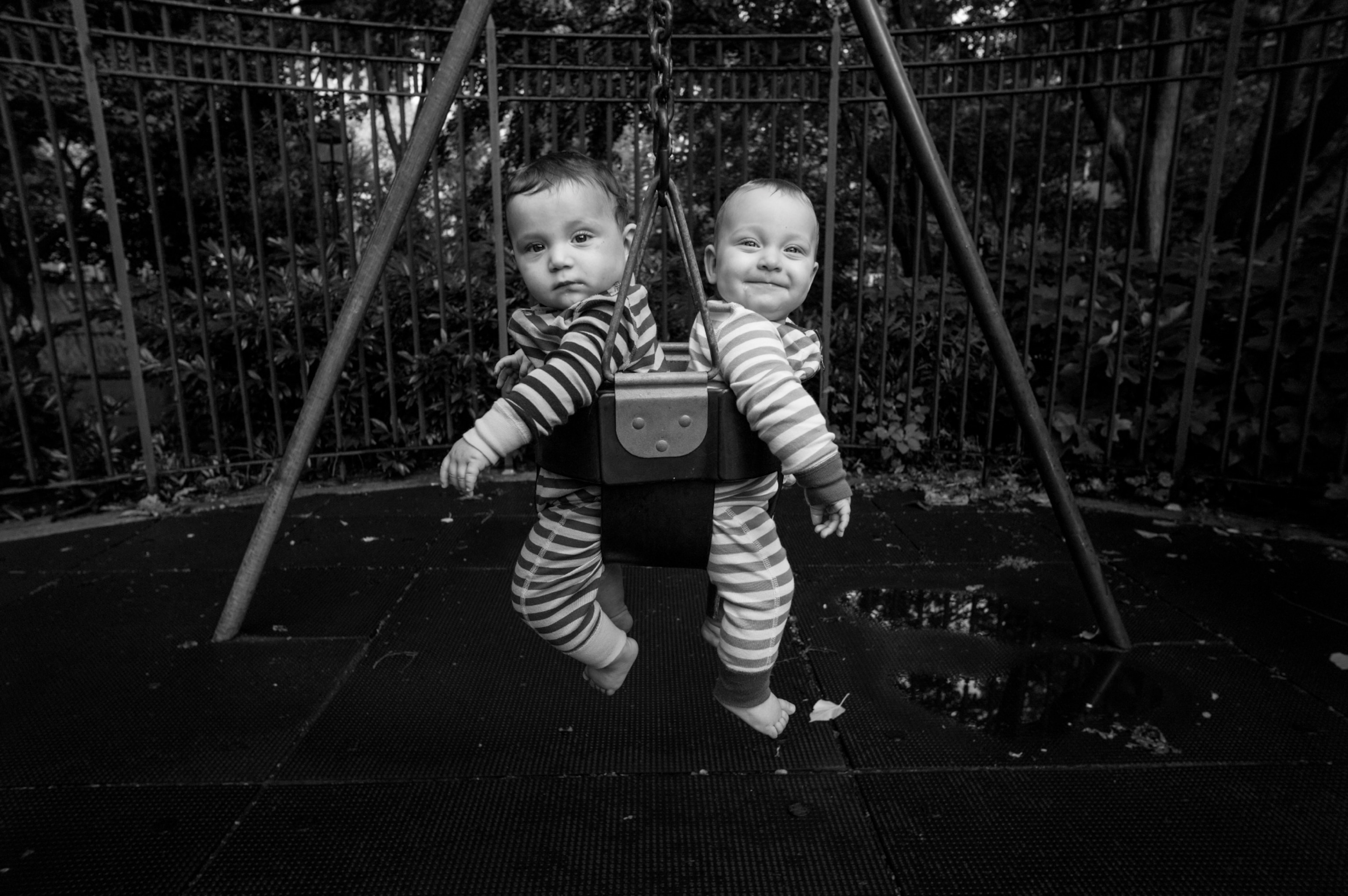 2 babies in swing