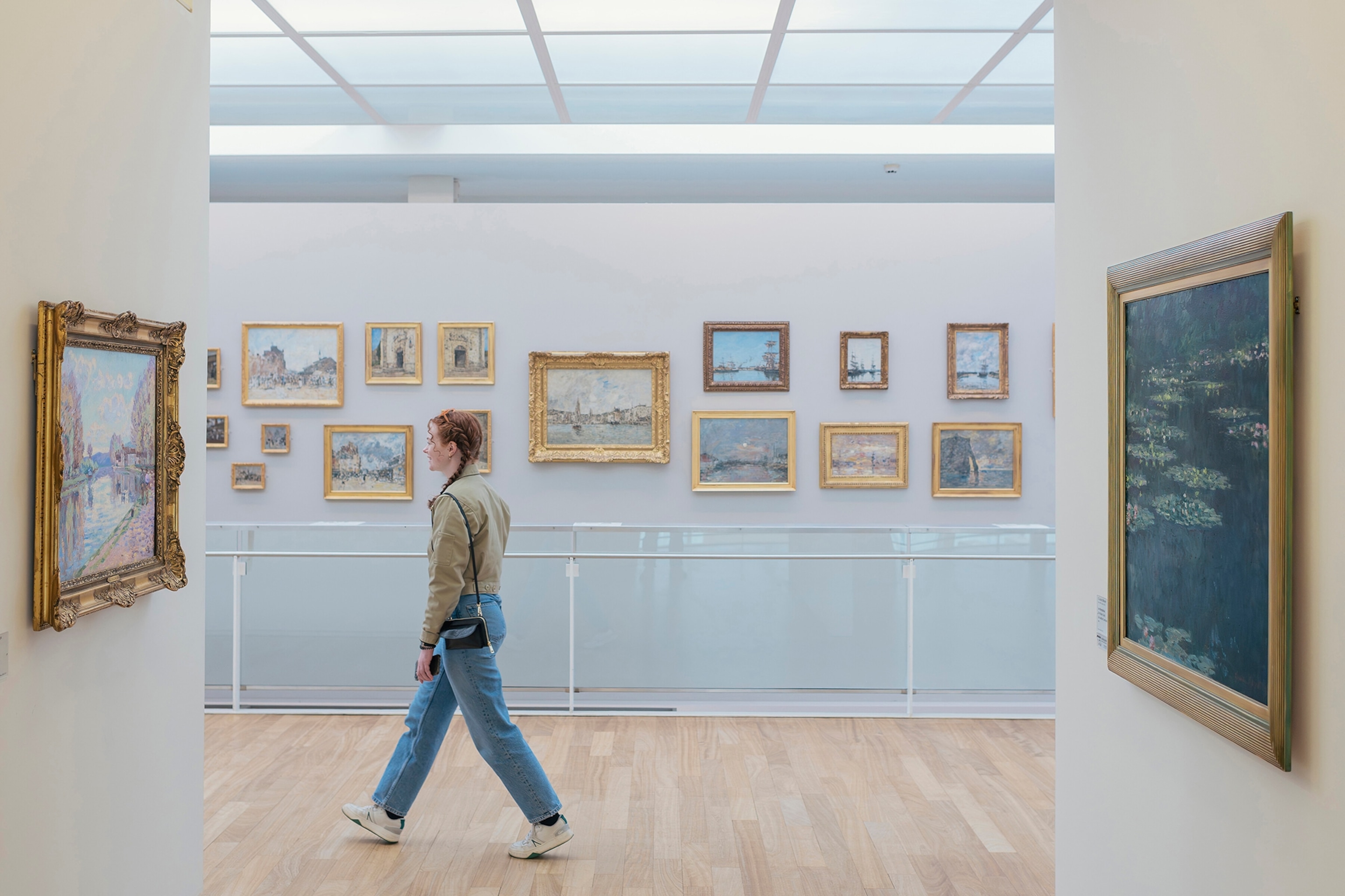 A visitor at the Musee d'Art Moderne Andre Malraux, known as MuMa, which features a collection of Impressionist paintings, in Le Havre, France, April 21, 2024.