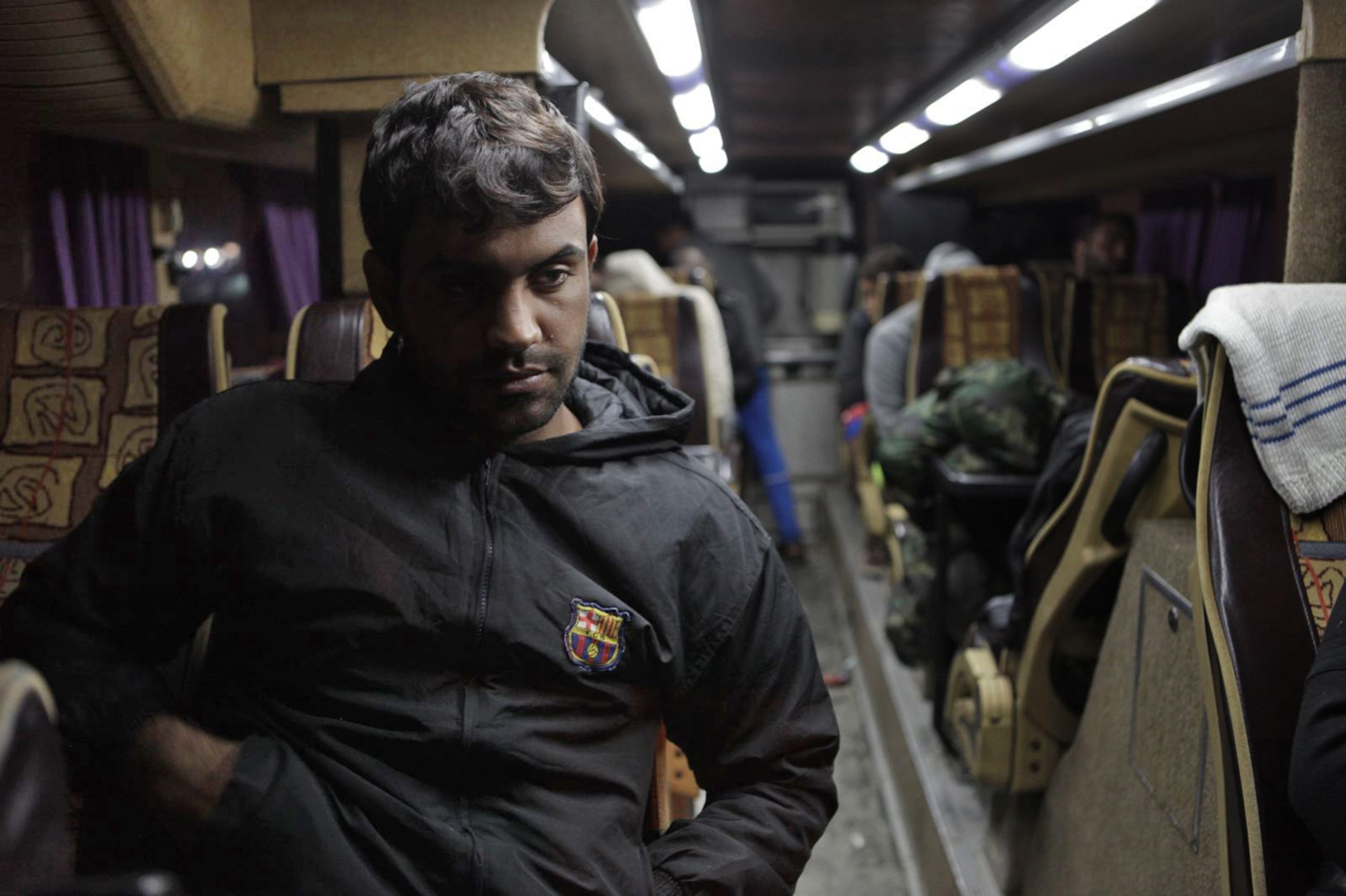 An Iraqi refugee in the bus between Cukarka and Belgrade, Serbia
