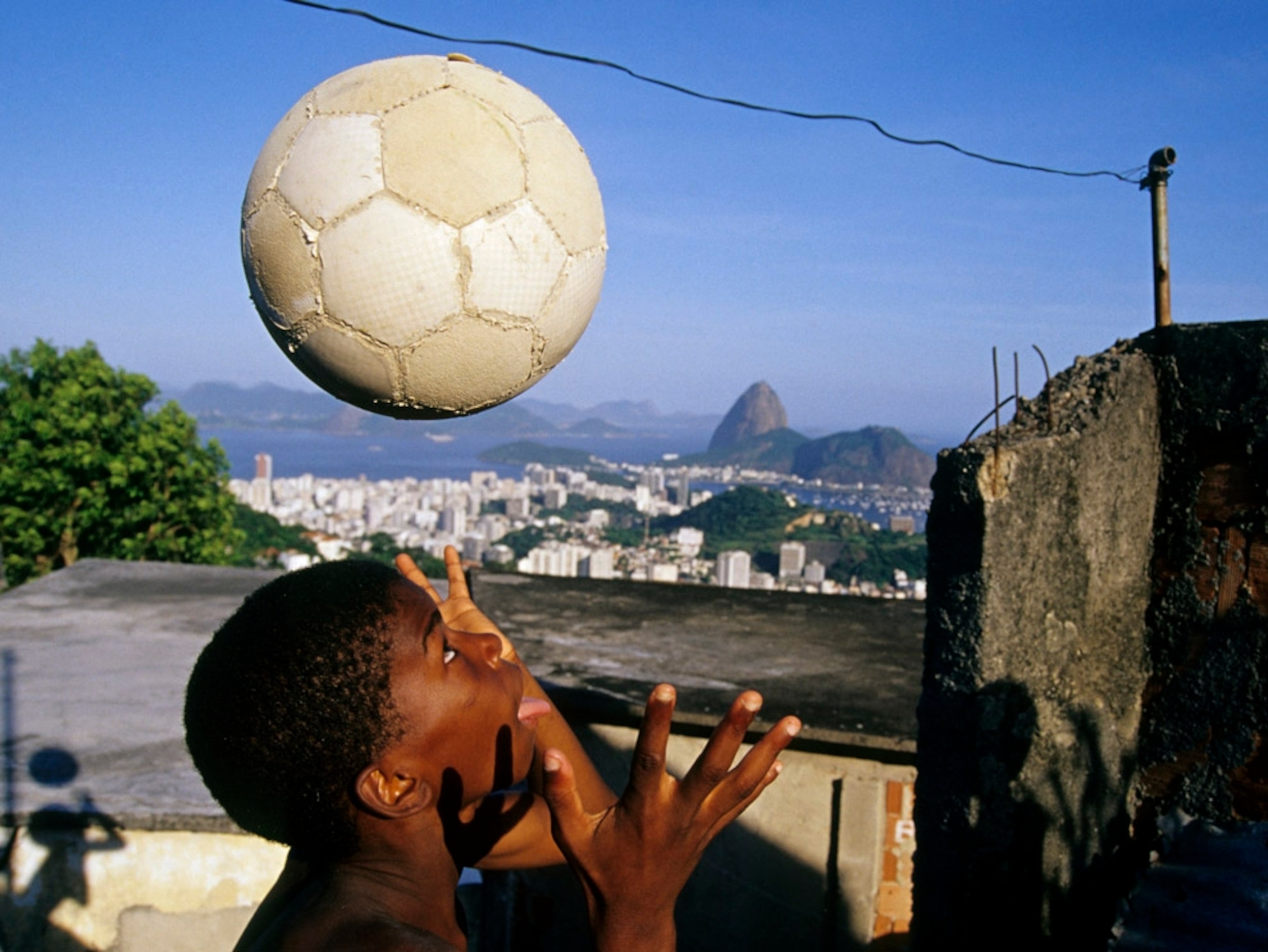 Child plays with a soccer ball