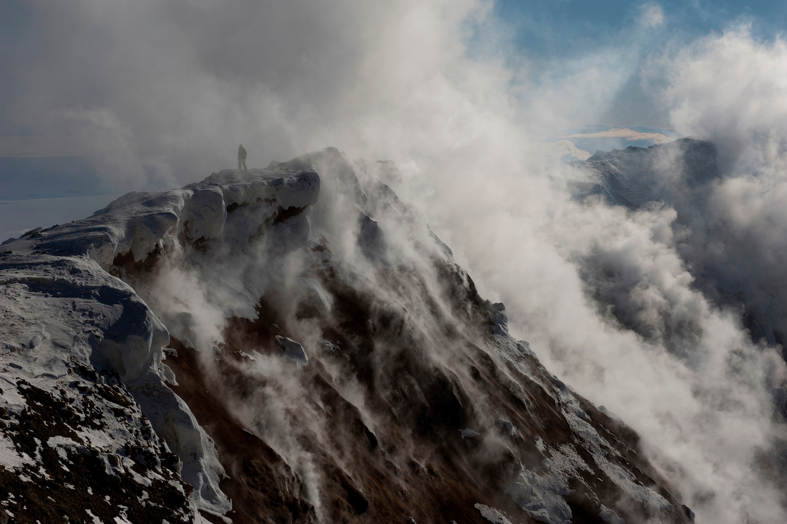 A biologist investigates the Erebus crater.