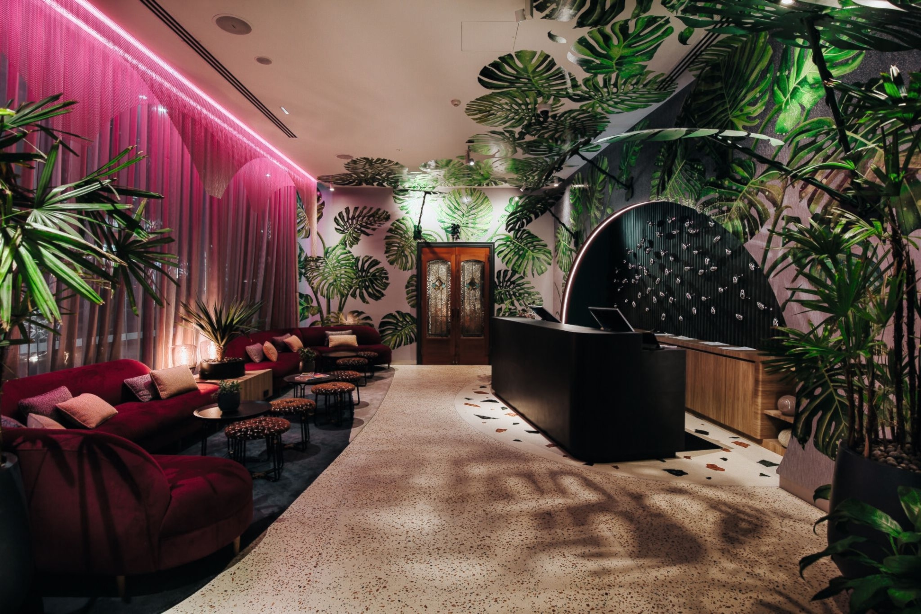 The tropical lobby area at Ovolo The Valley. Set on the edge of Brisbane’s live music district, the hotel frequently hosts musicians and their entourages.