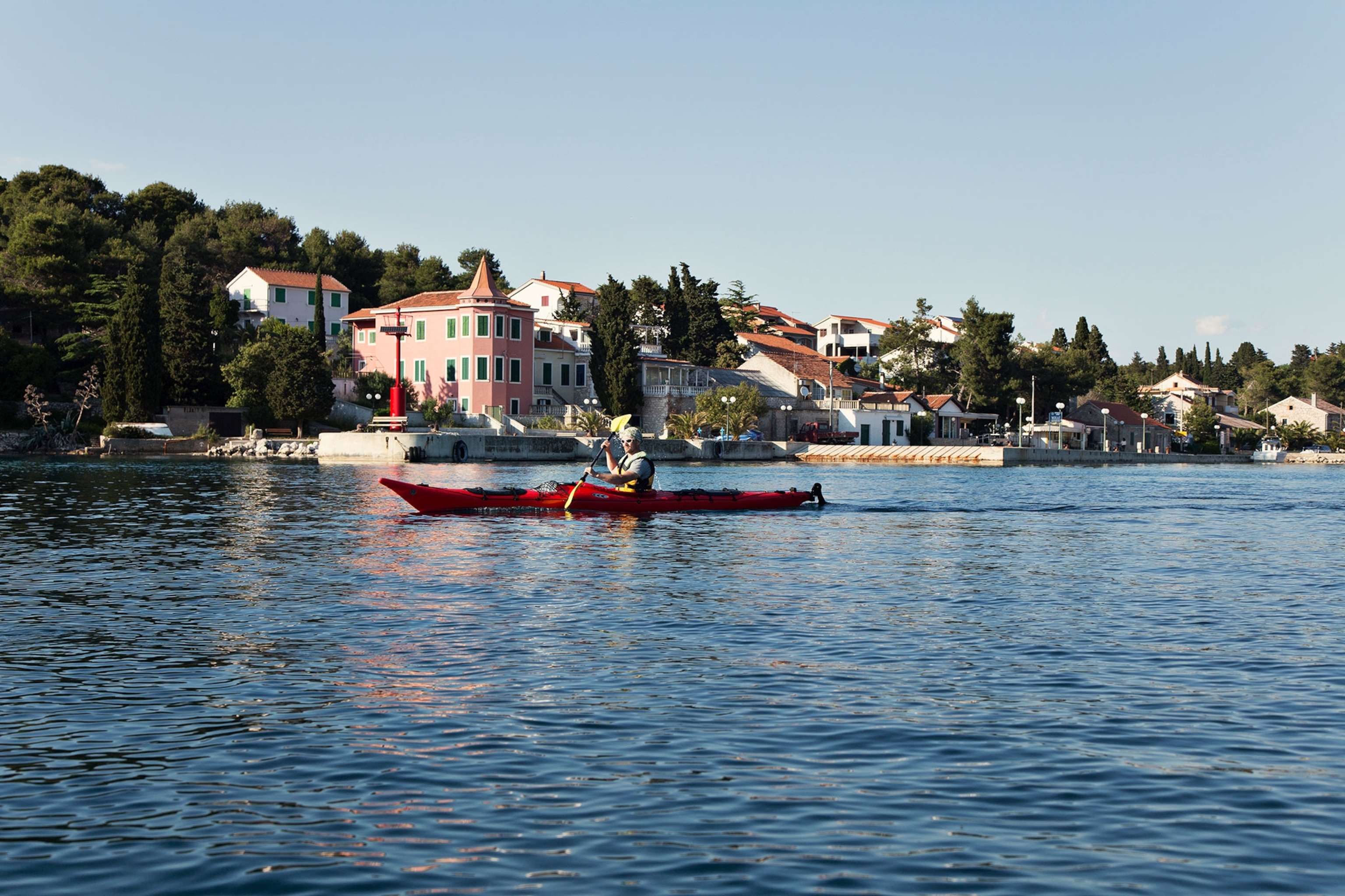 a sea kayaker paddling in Croatia