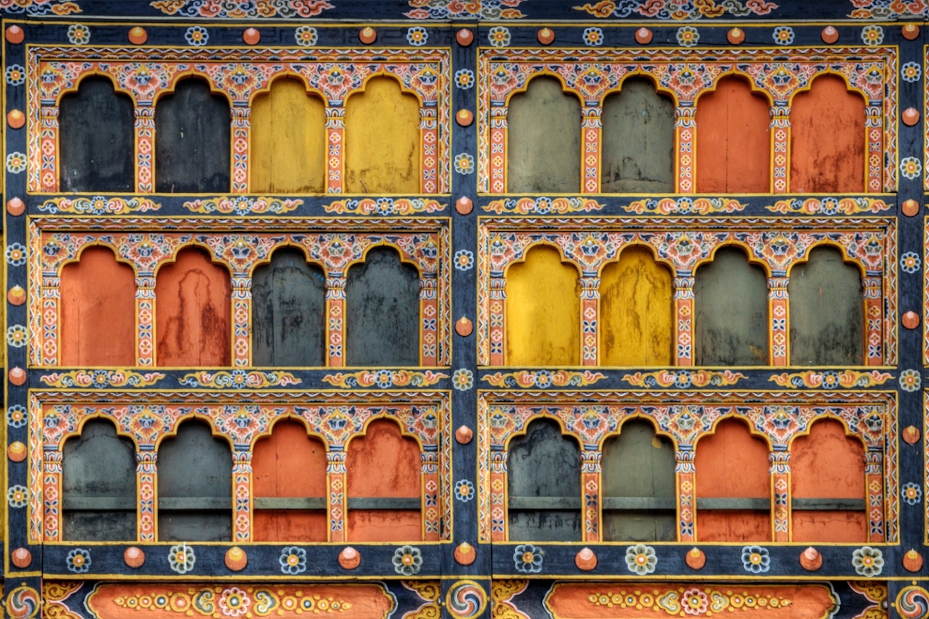 the brightly colored detail of Paro Dzong, Bhutan