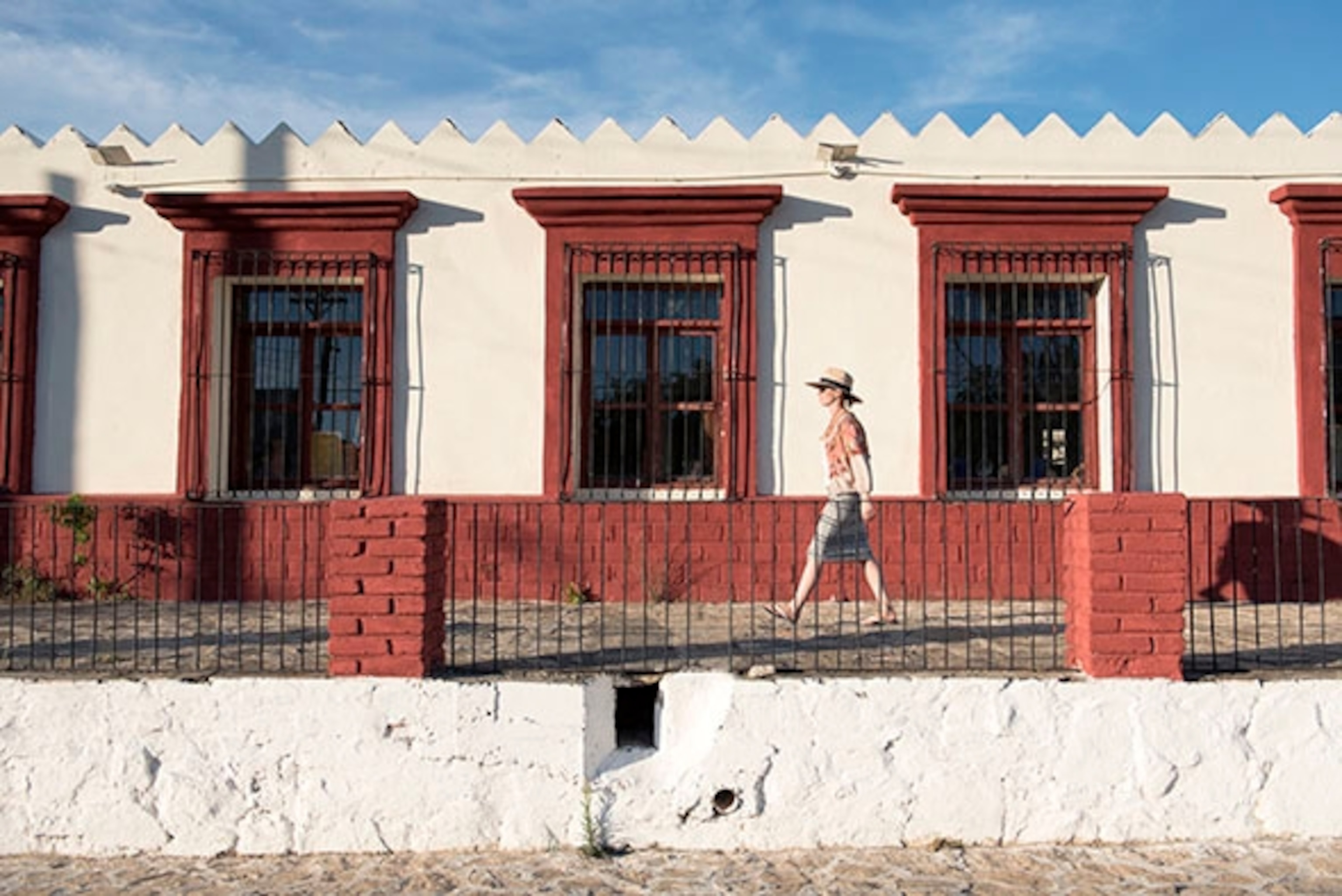 Catherine Yrisarri walks the streets of El Triunfo; Photograph by Max Lowe
