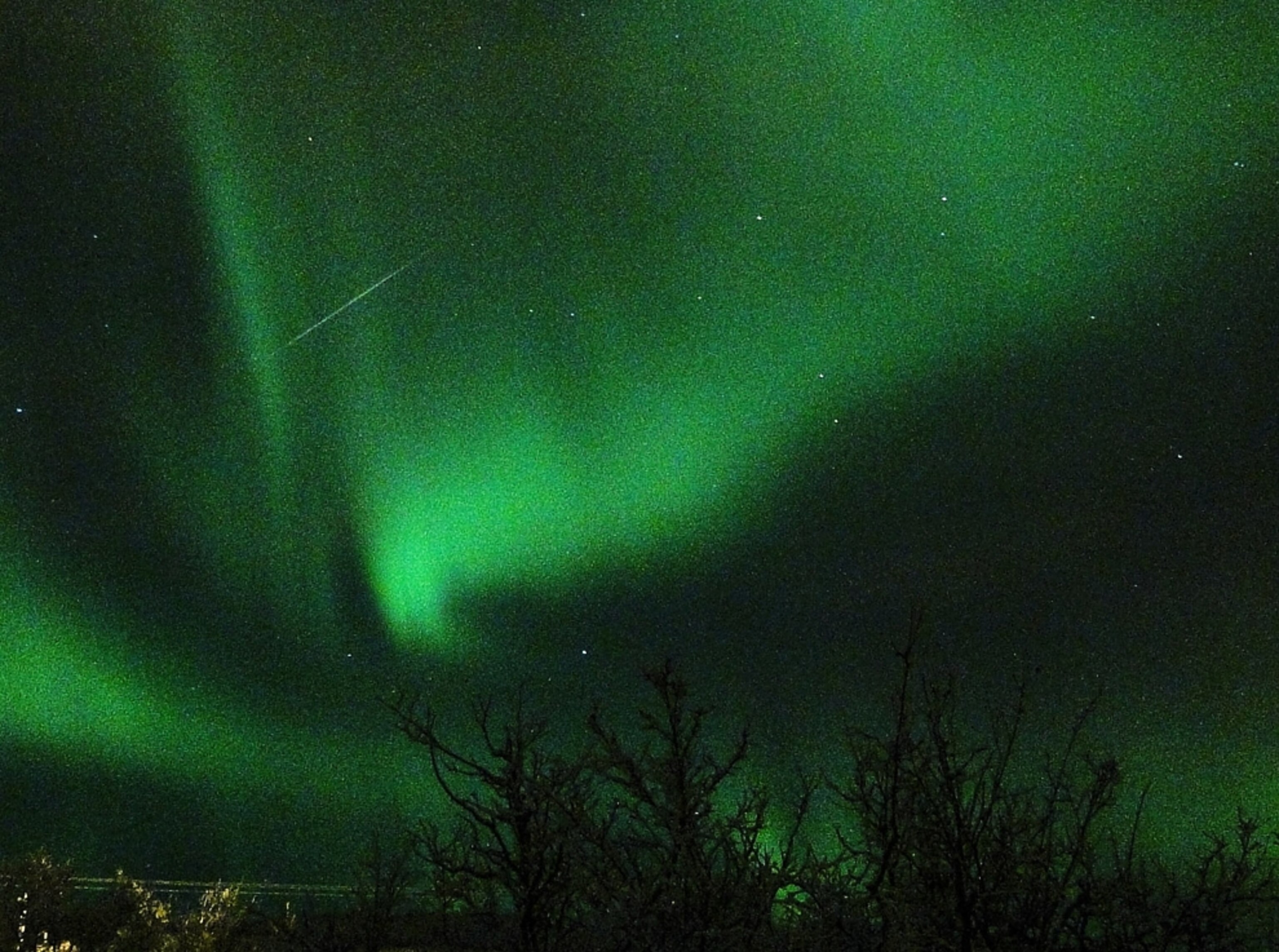 A Quadrantid meteor with an aurora over Norway -- picture from a photo gallery on the 2011 Quadrantid meteor shower