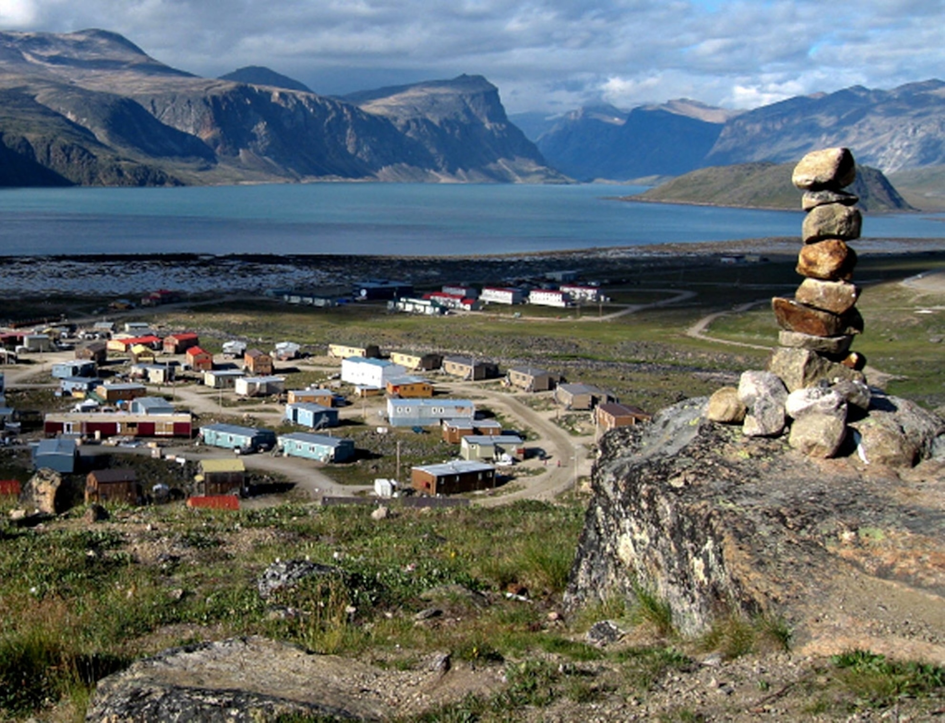 Vancouver 2010 picture: An Inukshuk overlooks the community of Pangnirtung, Nunavut