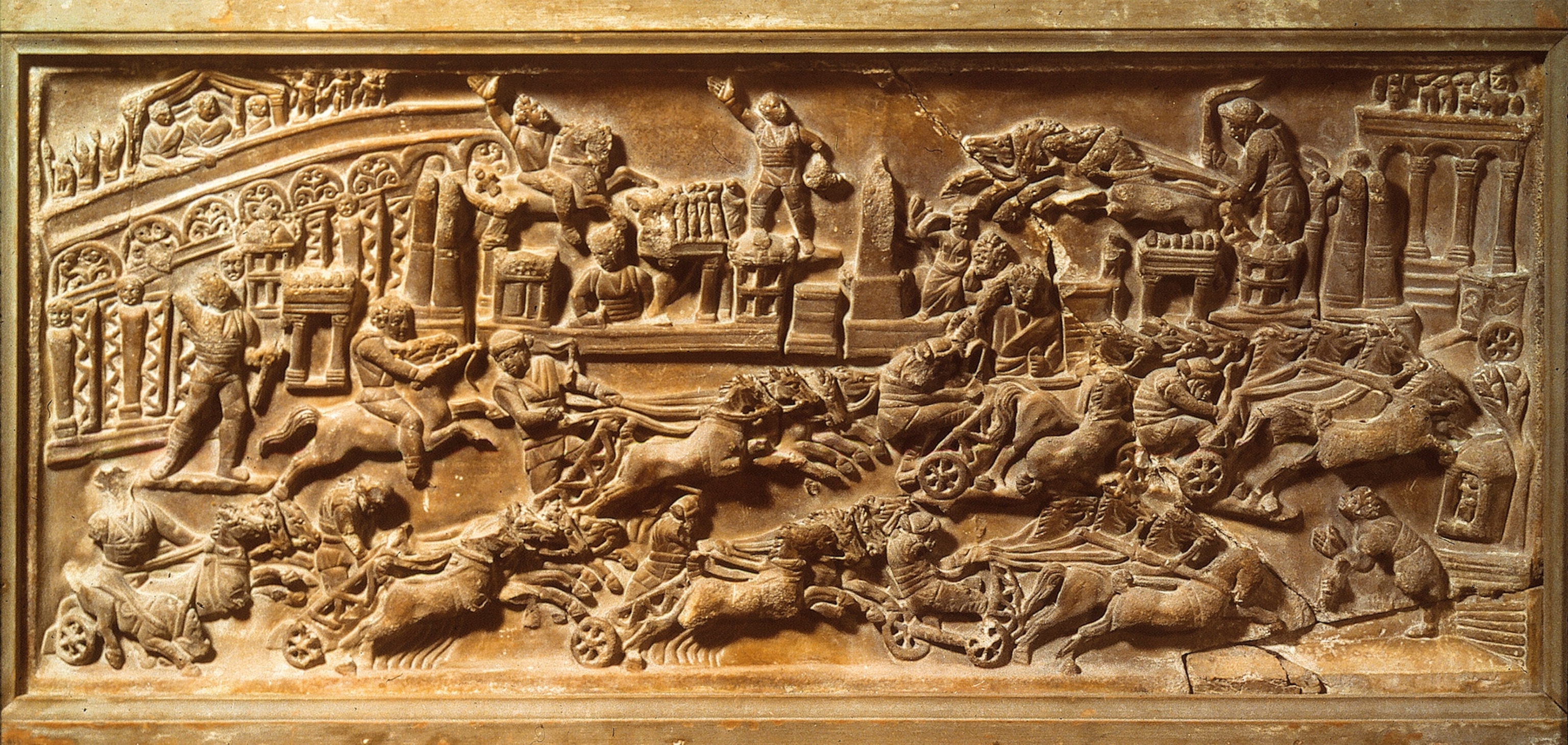 A relief of a chariot race