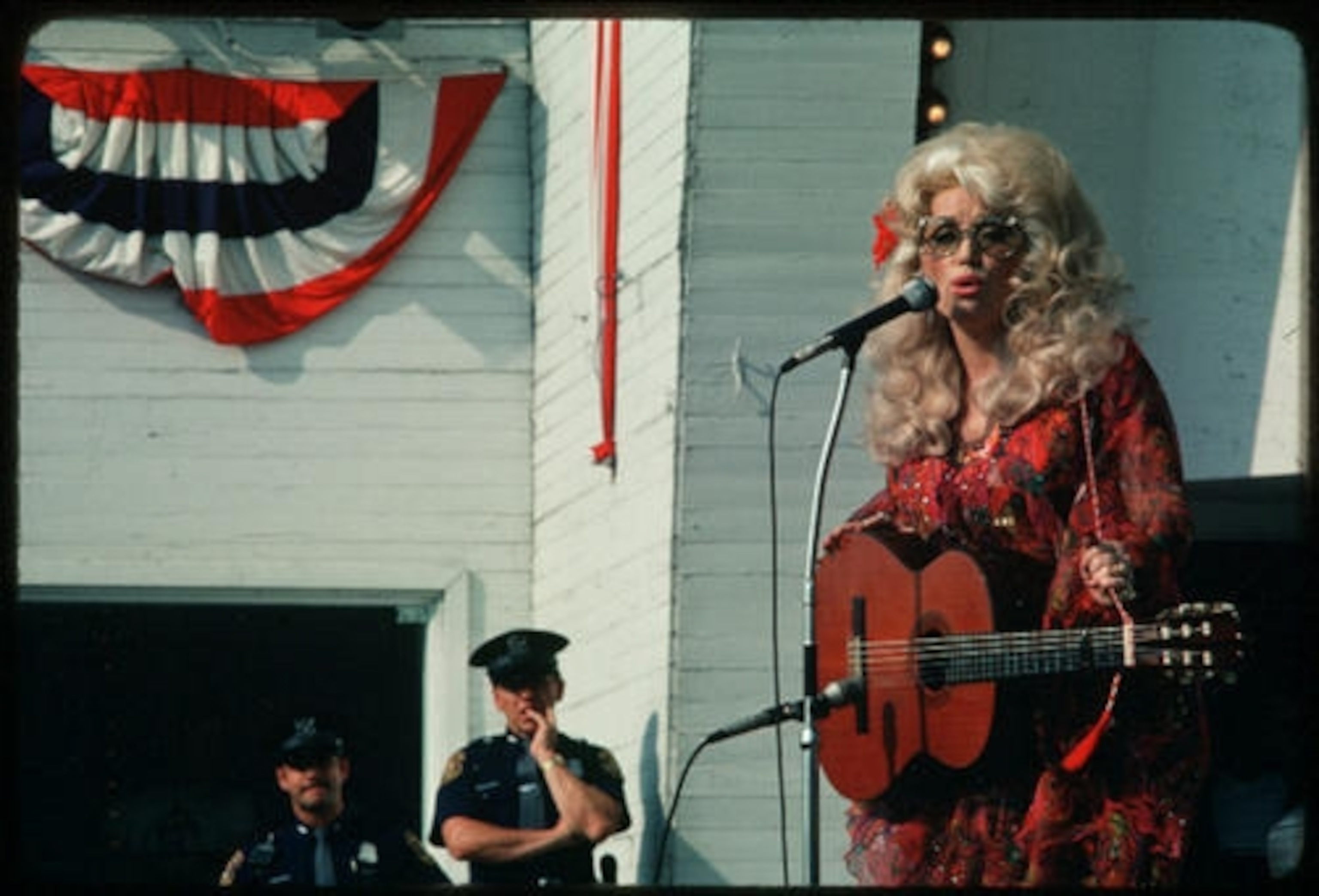 Dolly Parton performs in a midwest American town during a bus tour.